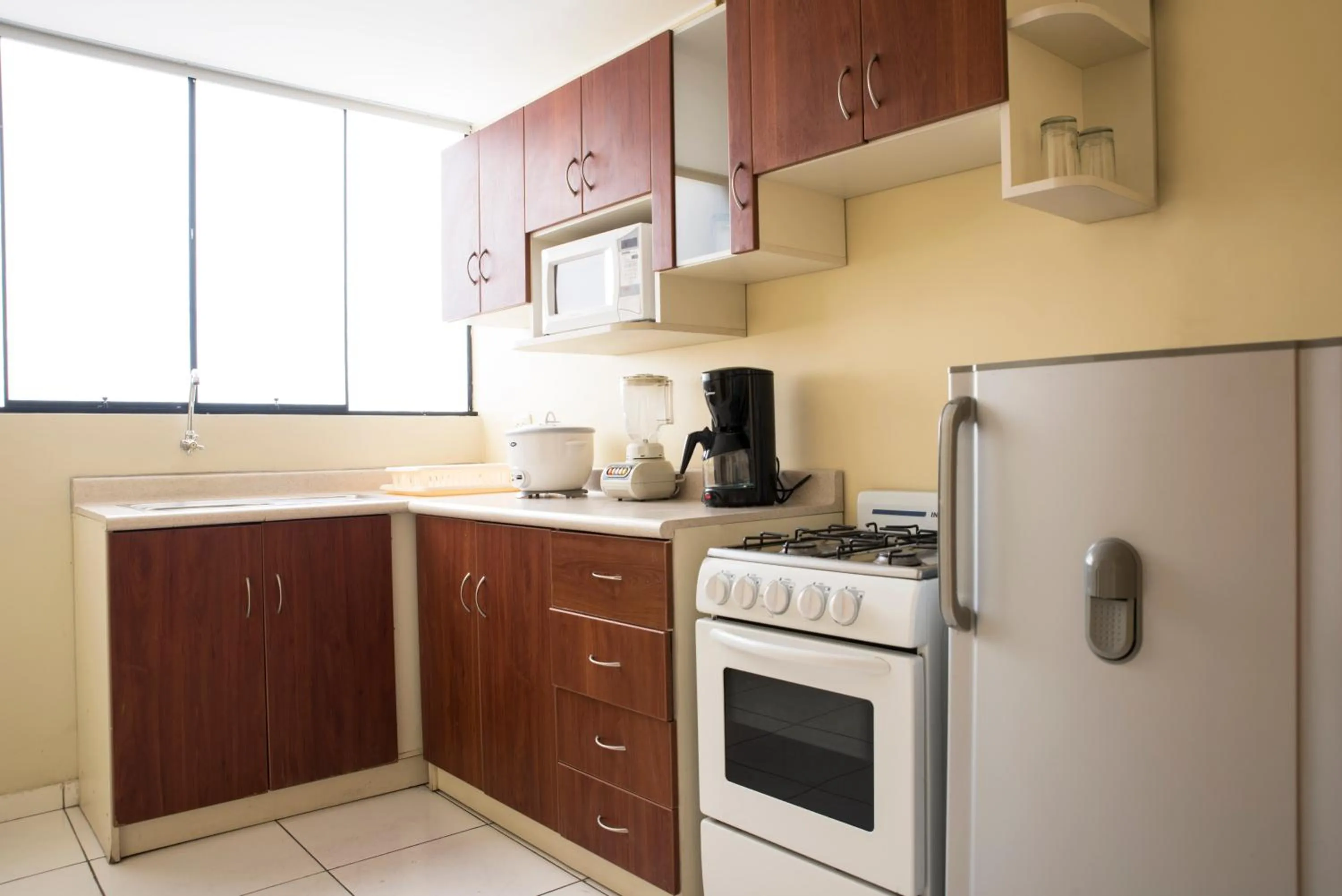 Kitchen or kitchenette in Inkari Apart Hotel