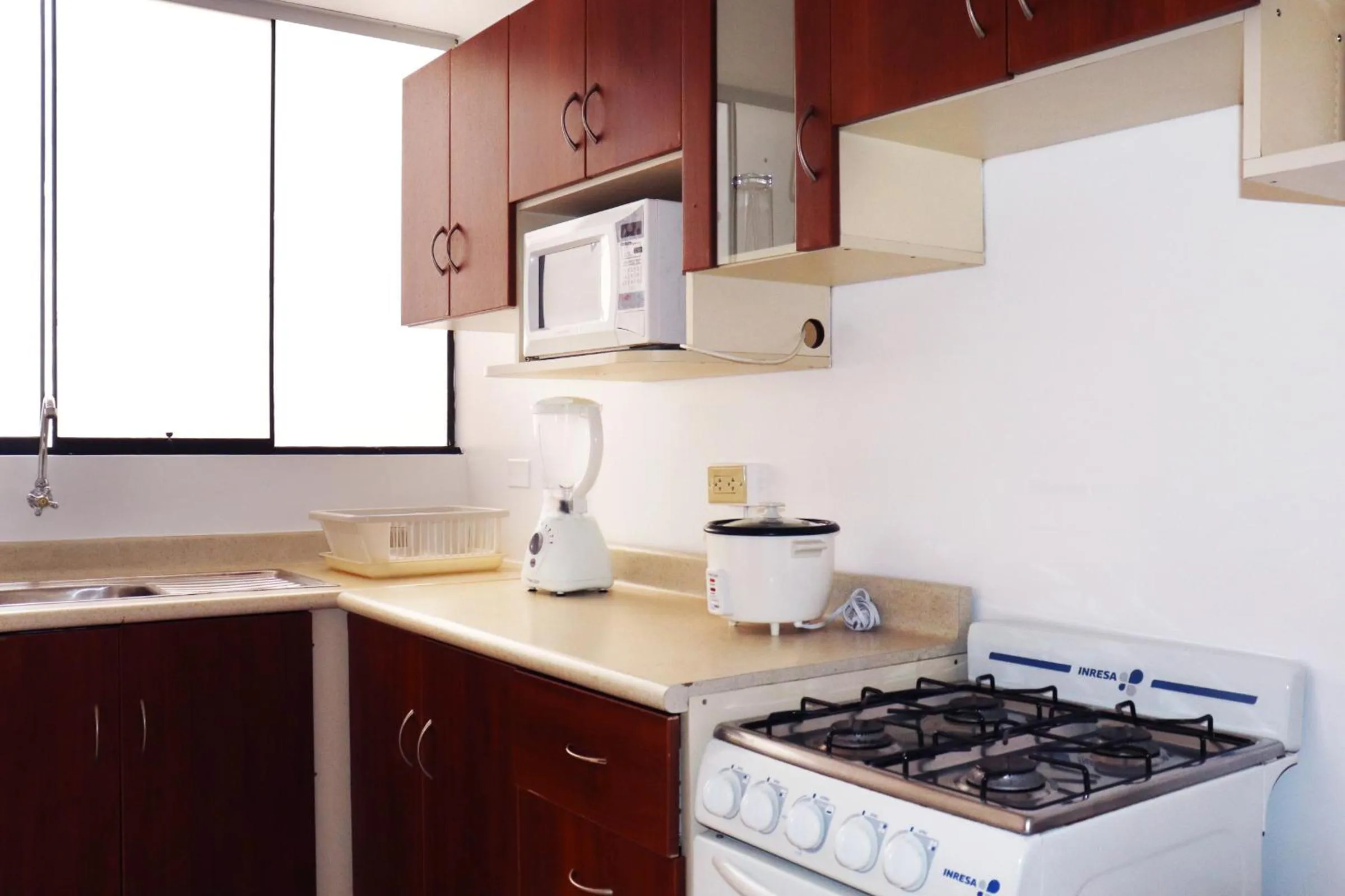 Kitchen or kitchenette in Inkari Apart Hotel