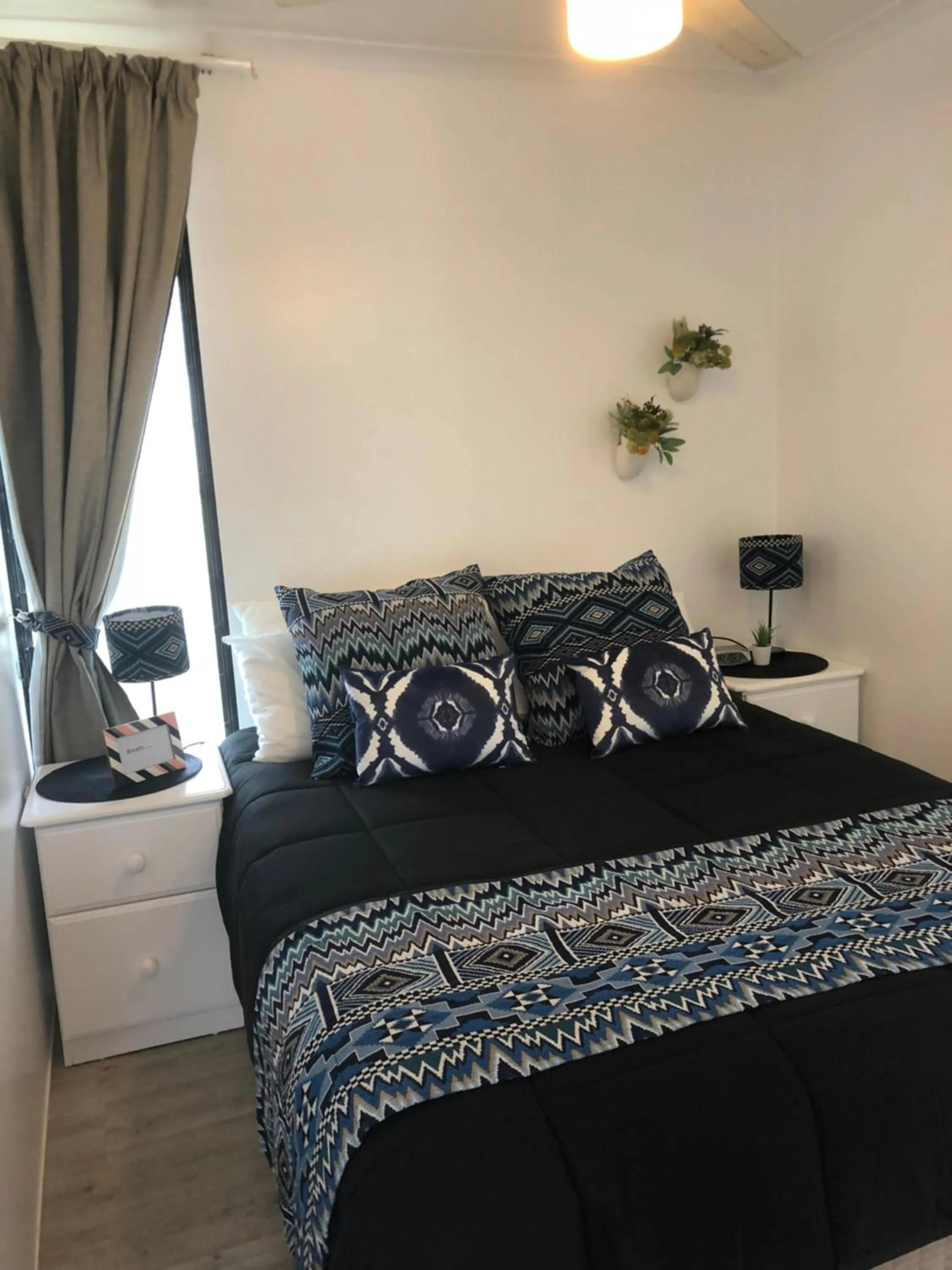 Bed in Maroochy River Bungalows