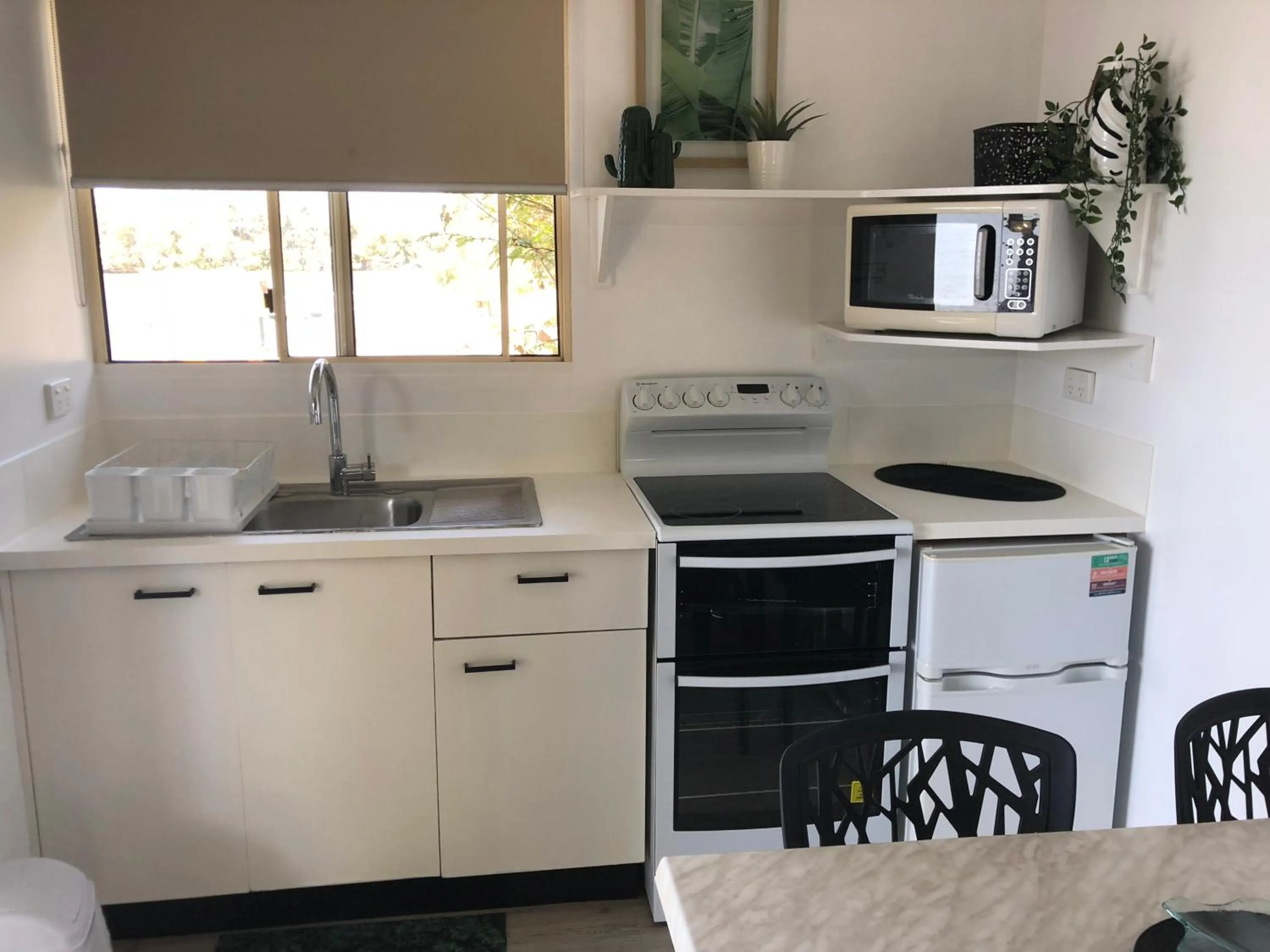 Kitchen or kitchenette in Maroochy River Bungalows