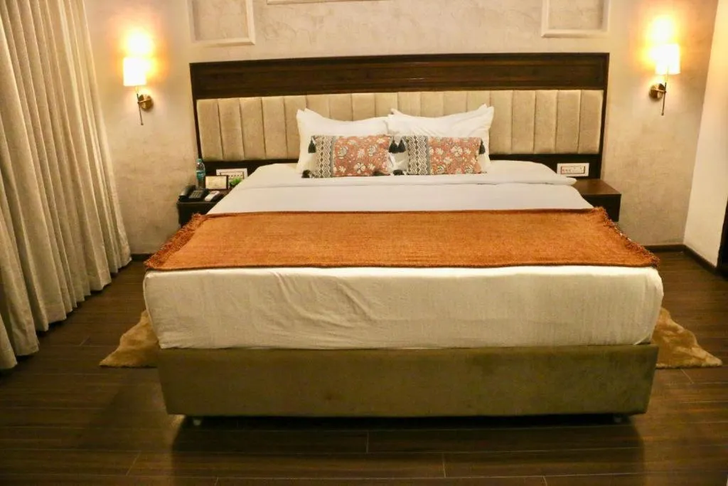 Bed in Nalapad's Hotel Bangalore International