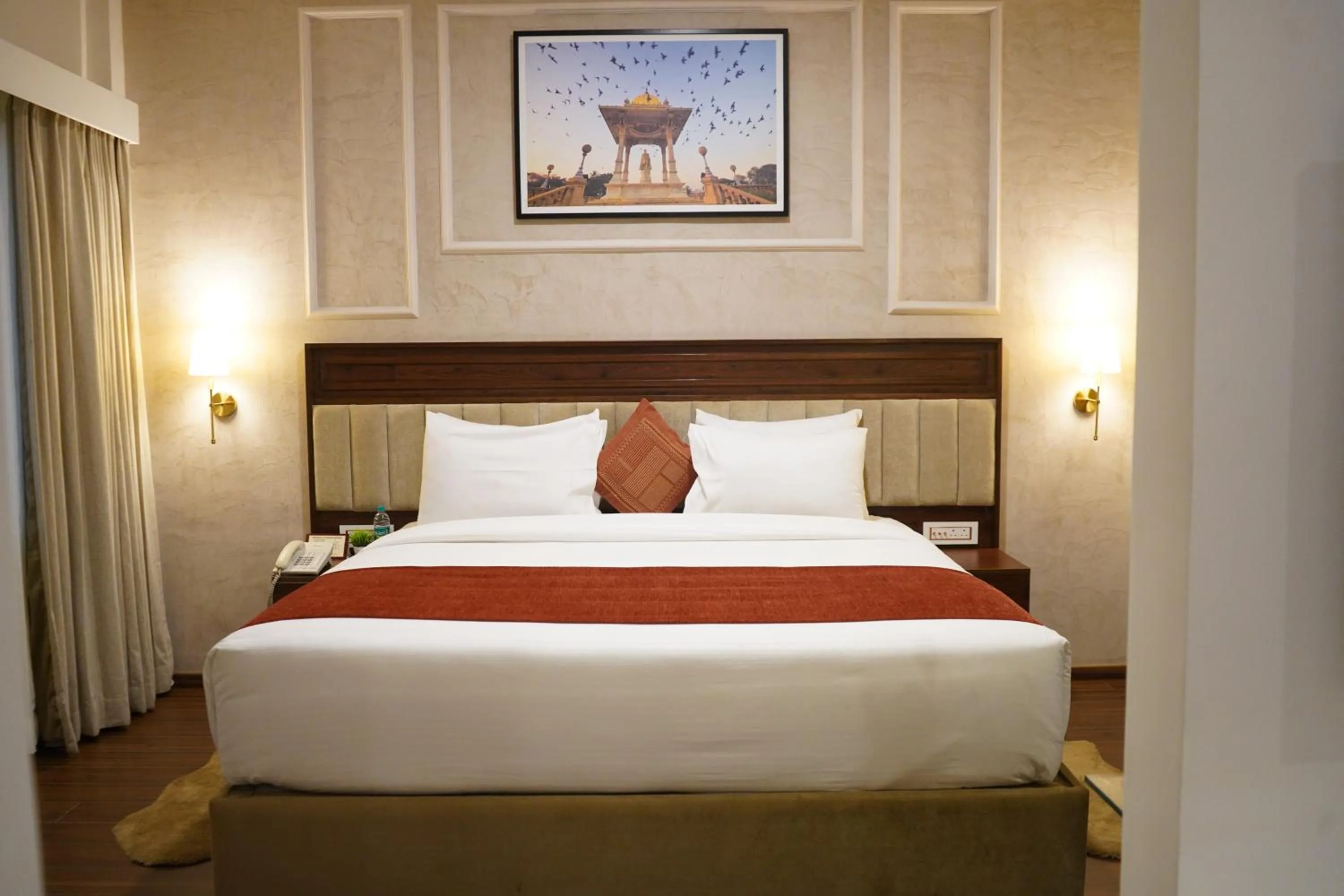 Bed in Nalapad's Hotel Bangalore International