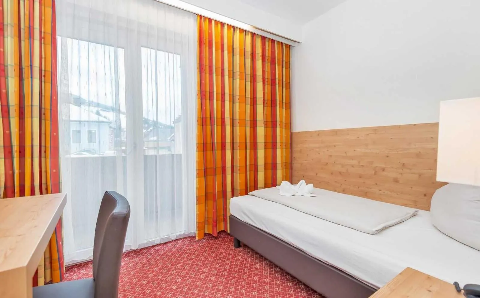 Bed in Hotel Rössl-Dependance Neue Post