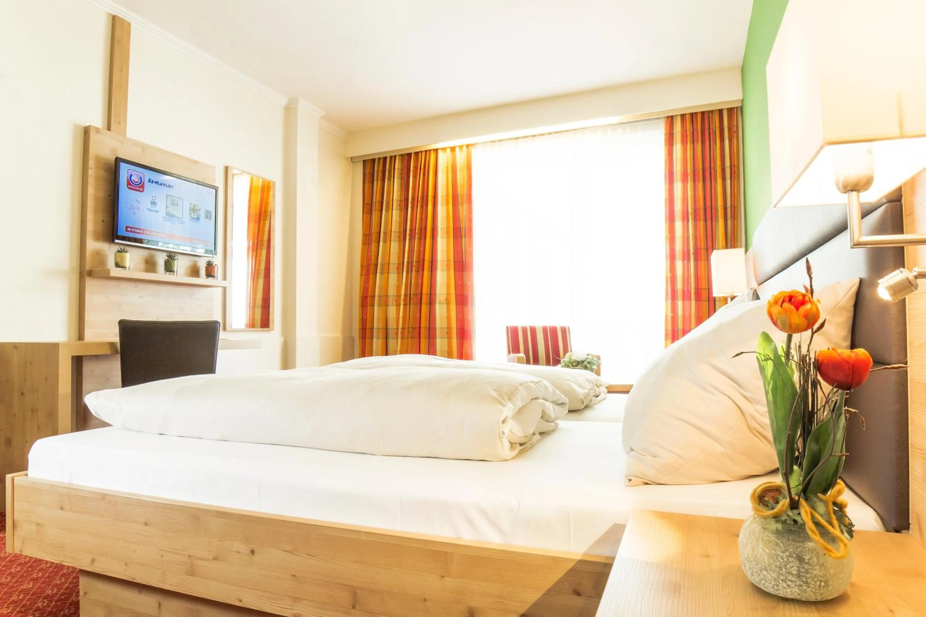 Bed in Hotel Rössl-Dependance Neue Post