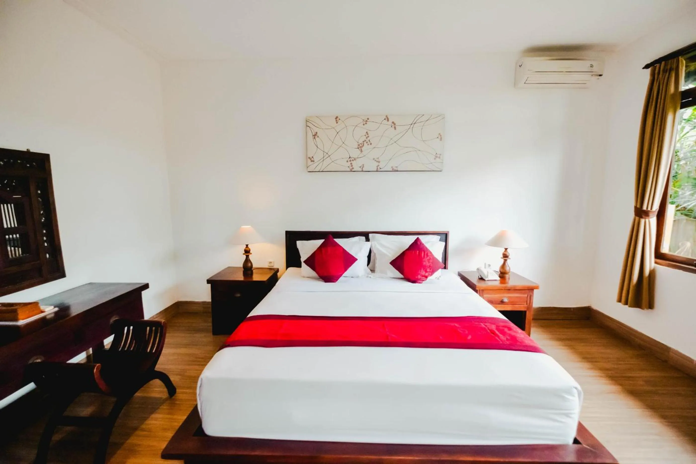 Bed in Sri Aksata Ubud Resort