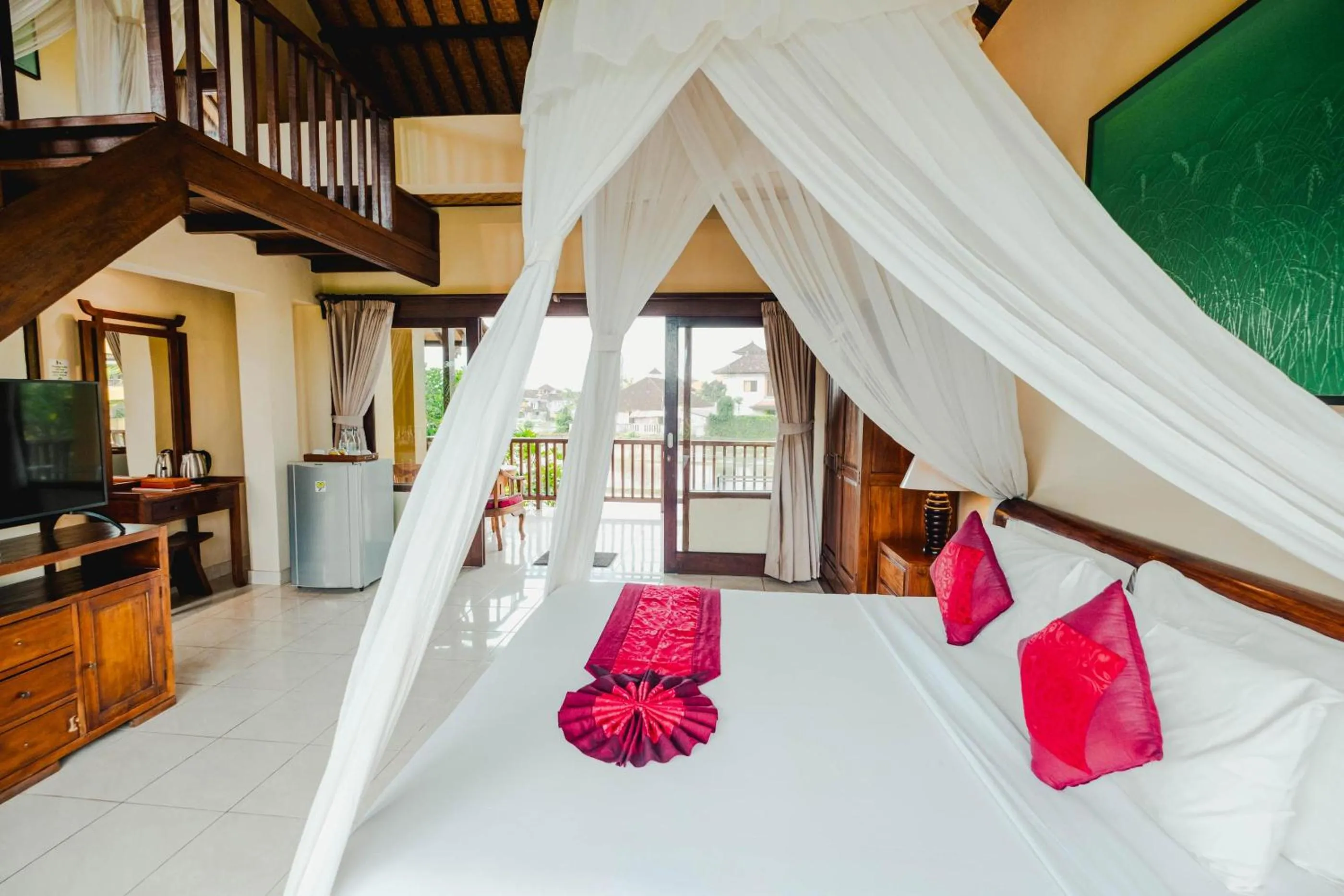 Bed in Sri Aksata Ubud Resort