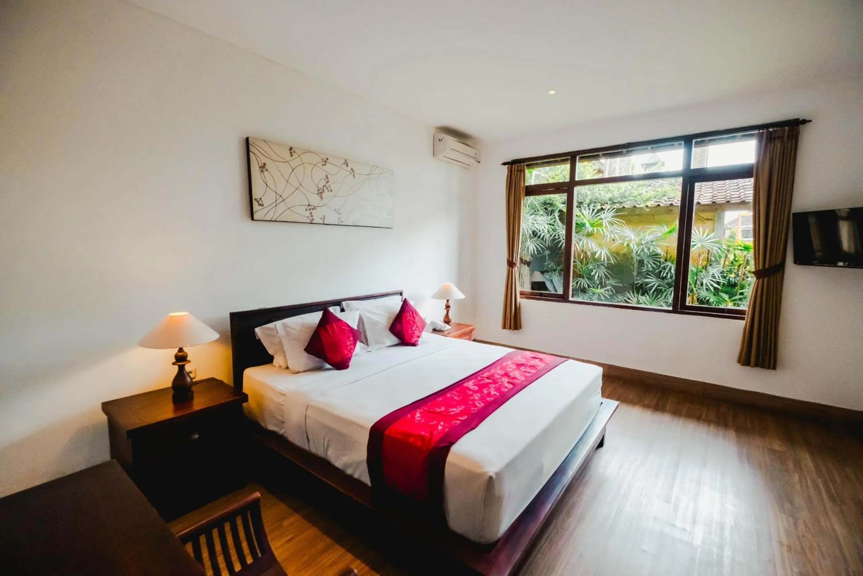 Bed in Sri Aksata Ubud Resort