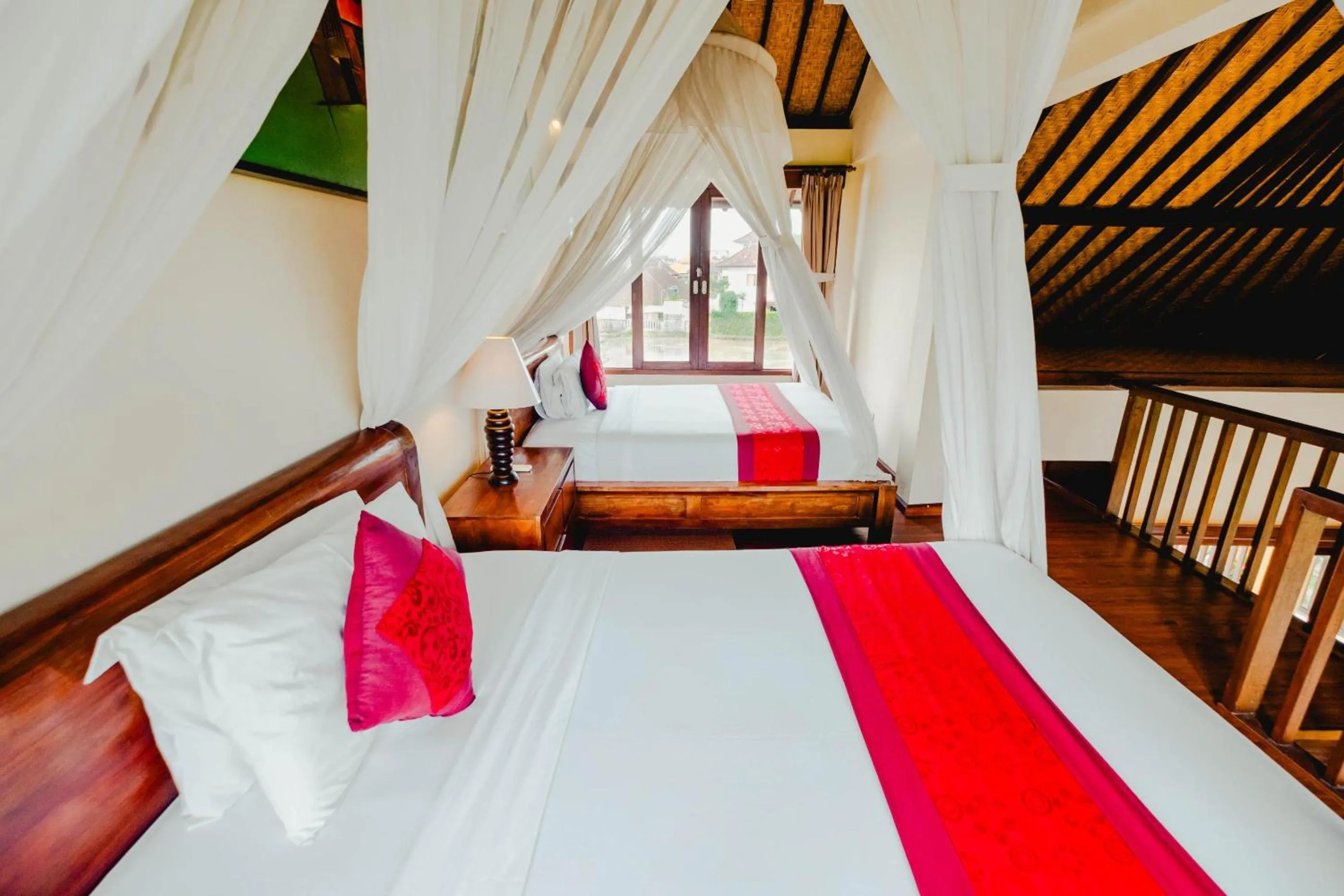 Bed in Sri Aksata Ubud Resort