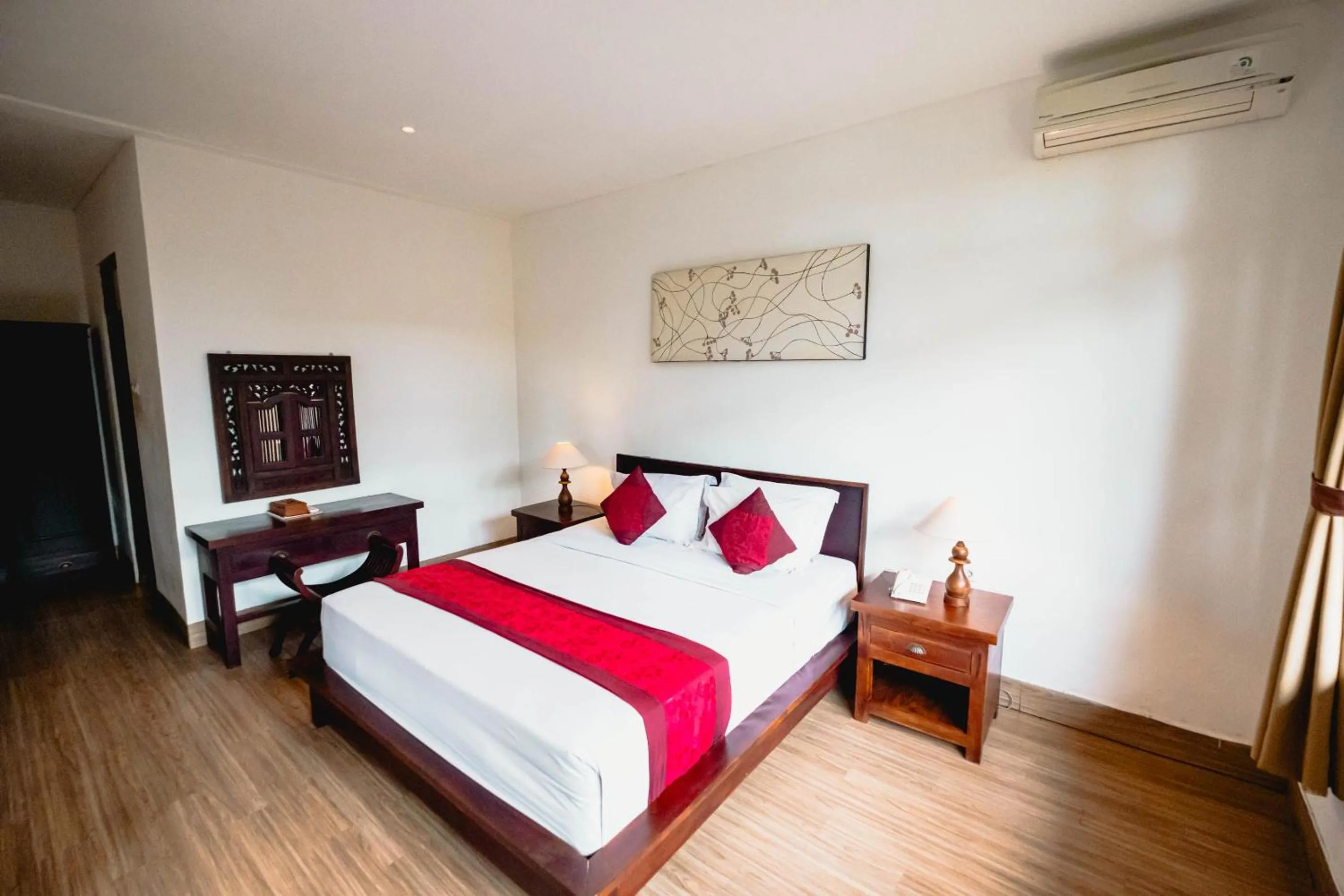 Bed in Sri Aksata Ubud Resort