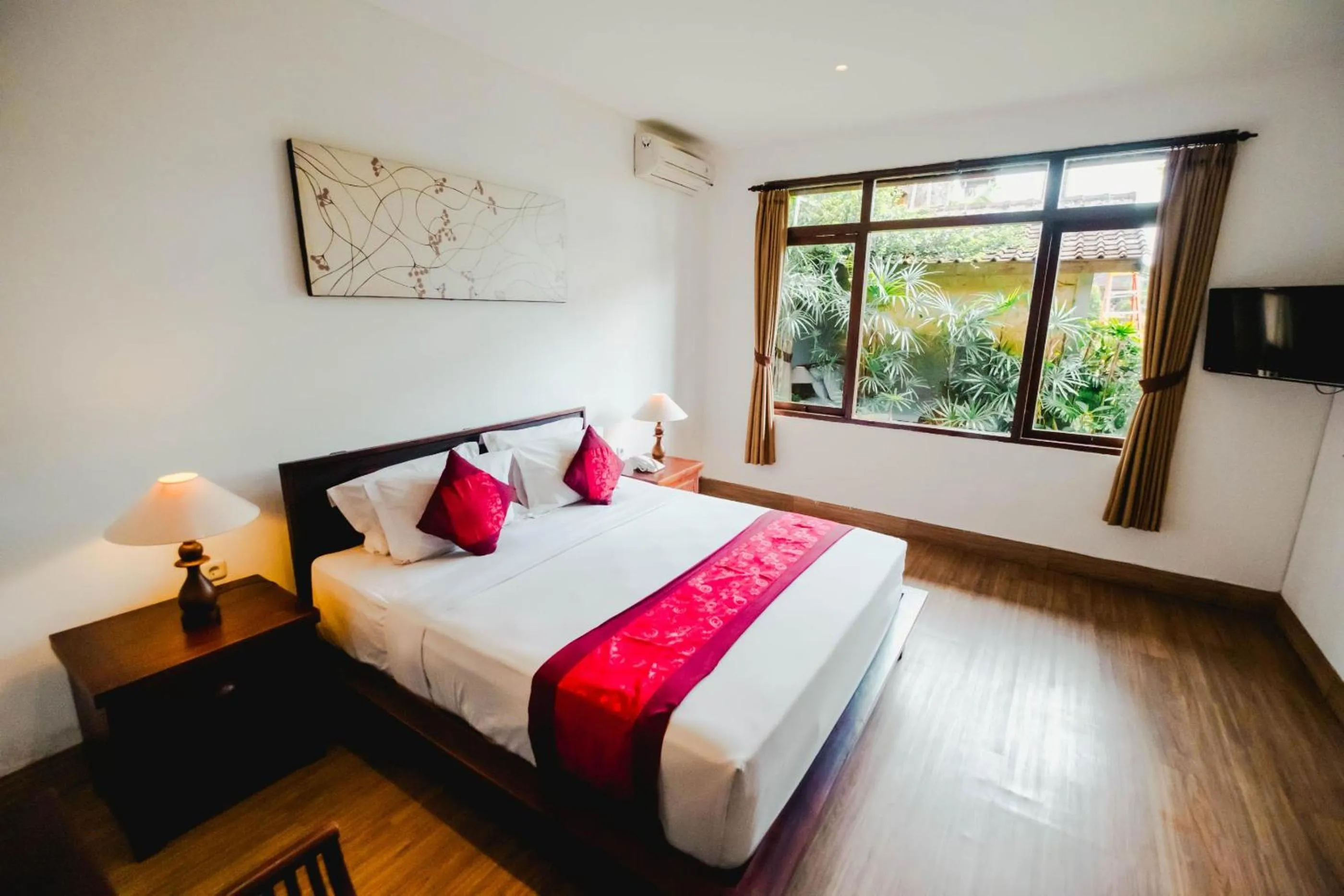 Bed in Sri Aksata Ubud Resort