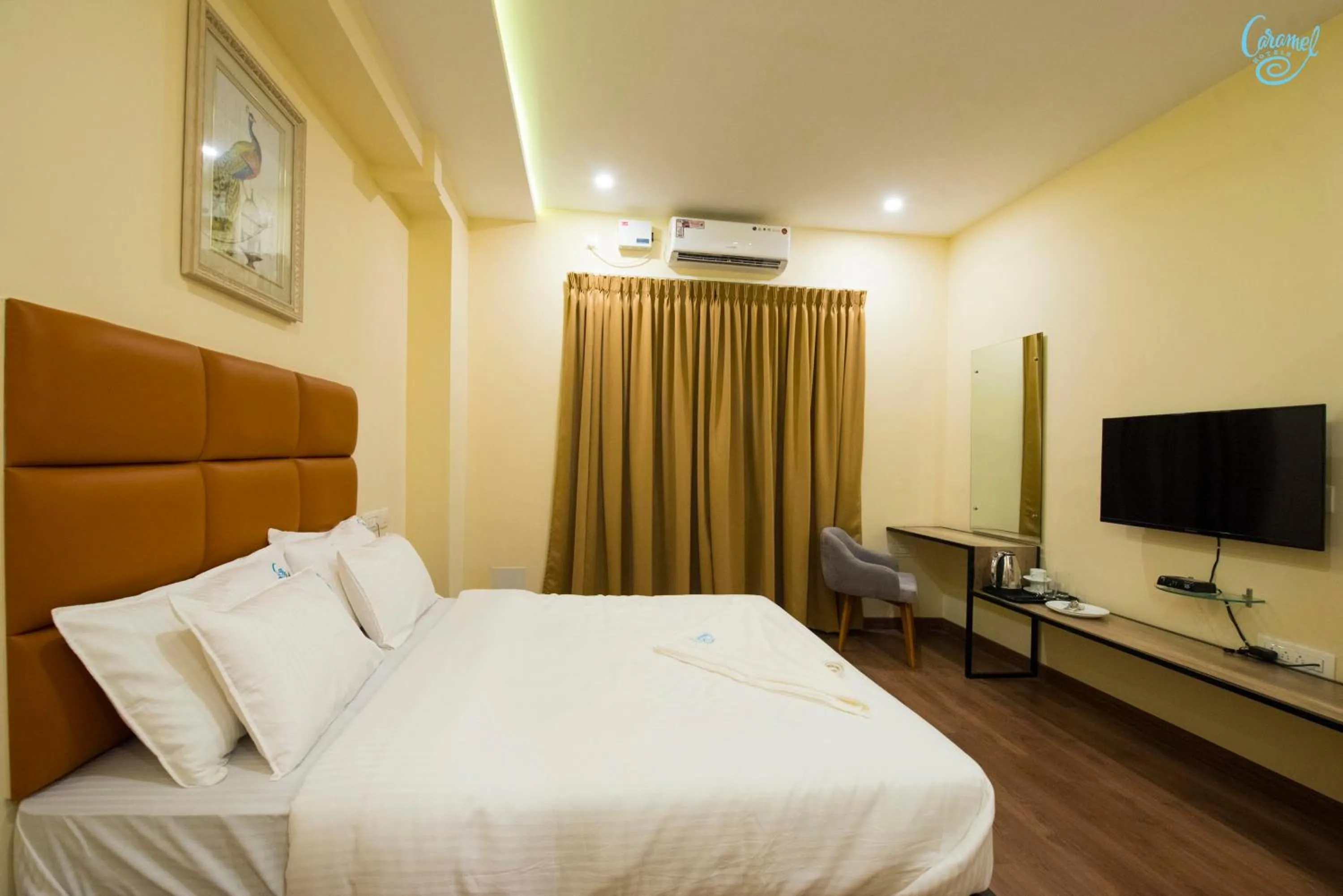 Bedroom, Bed in Caramel Hotels