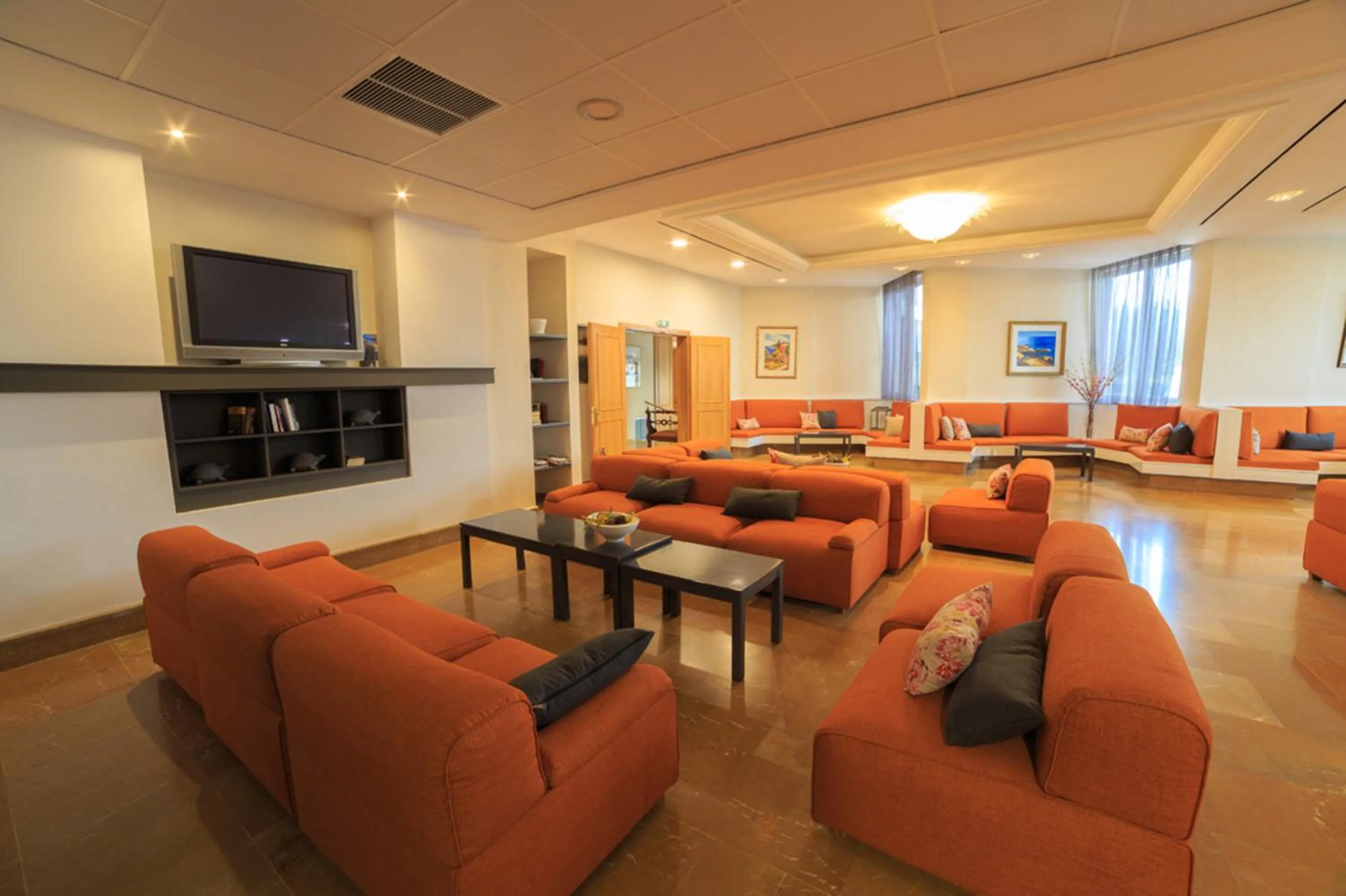 Communal lounge/ TV room in Elea Beach Hotel
