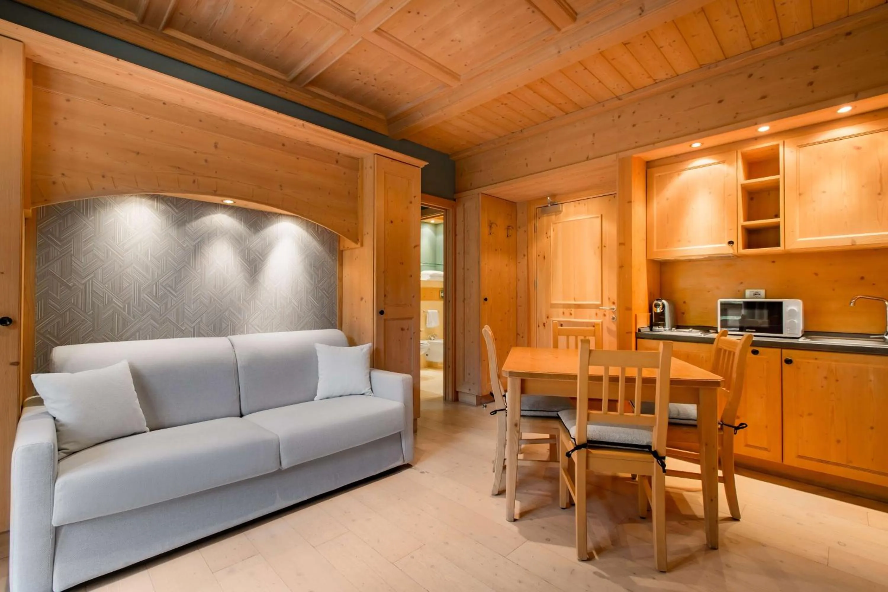 Photo of the whole room in Radisson Residences Savoia Palace Cortina d’Ampezzo