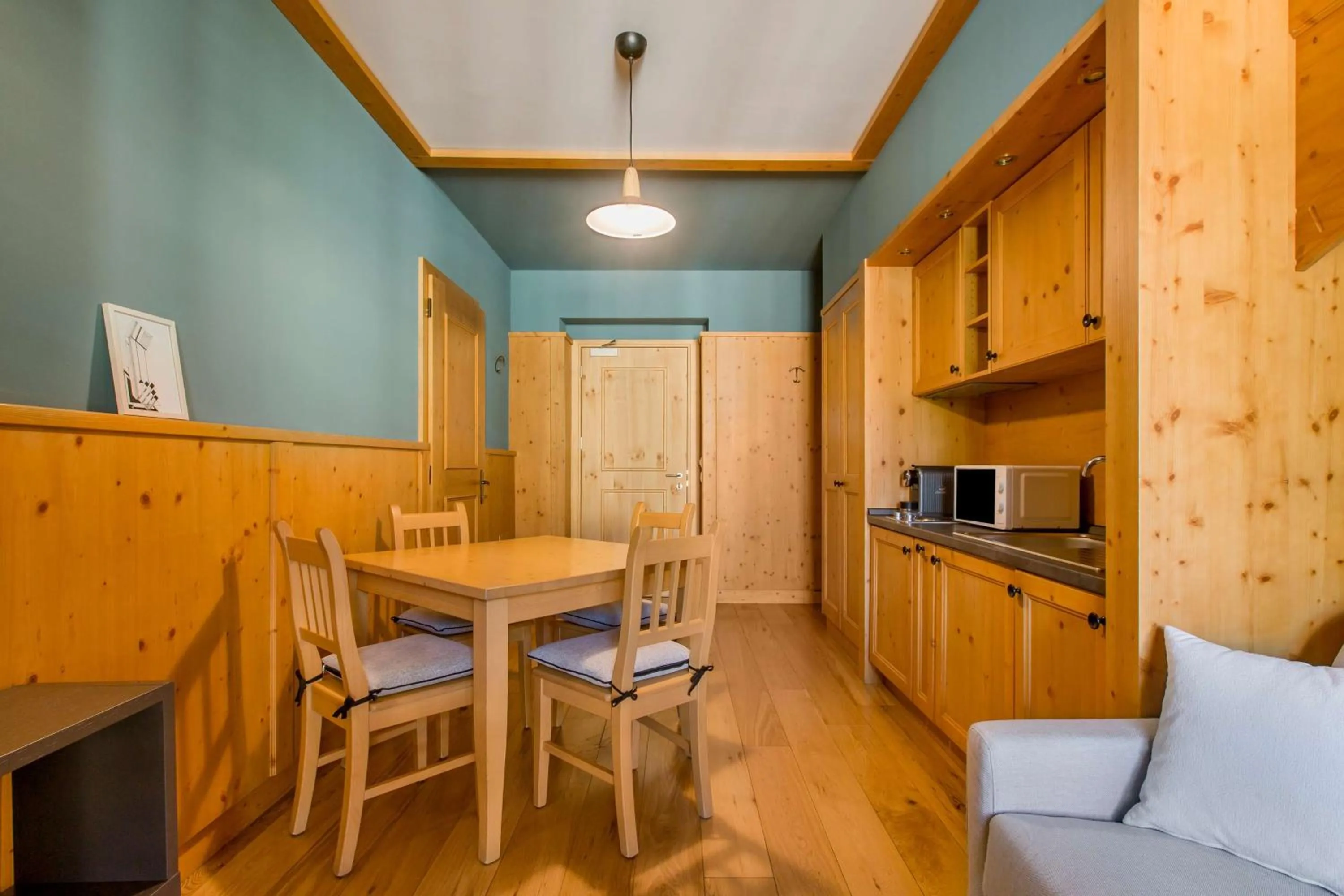 Photo of the whole room in Radisson Residences Savoia Palace Cortina d’Ampezzo