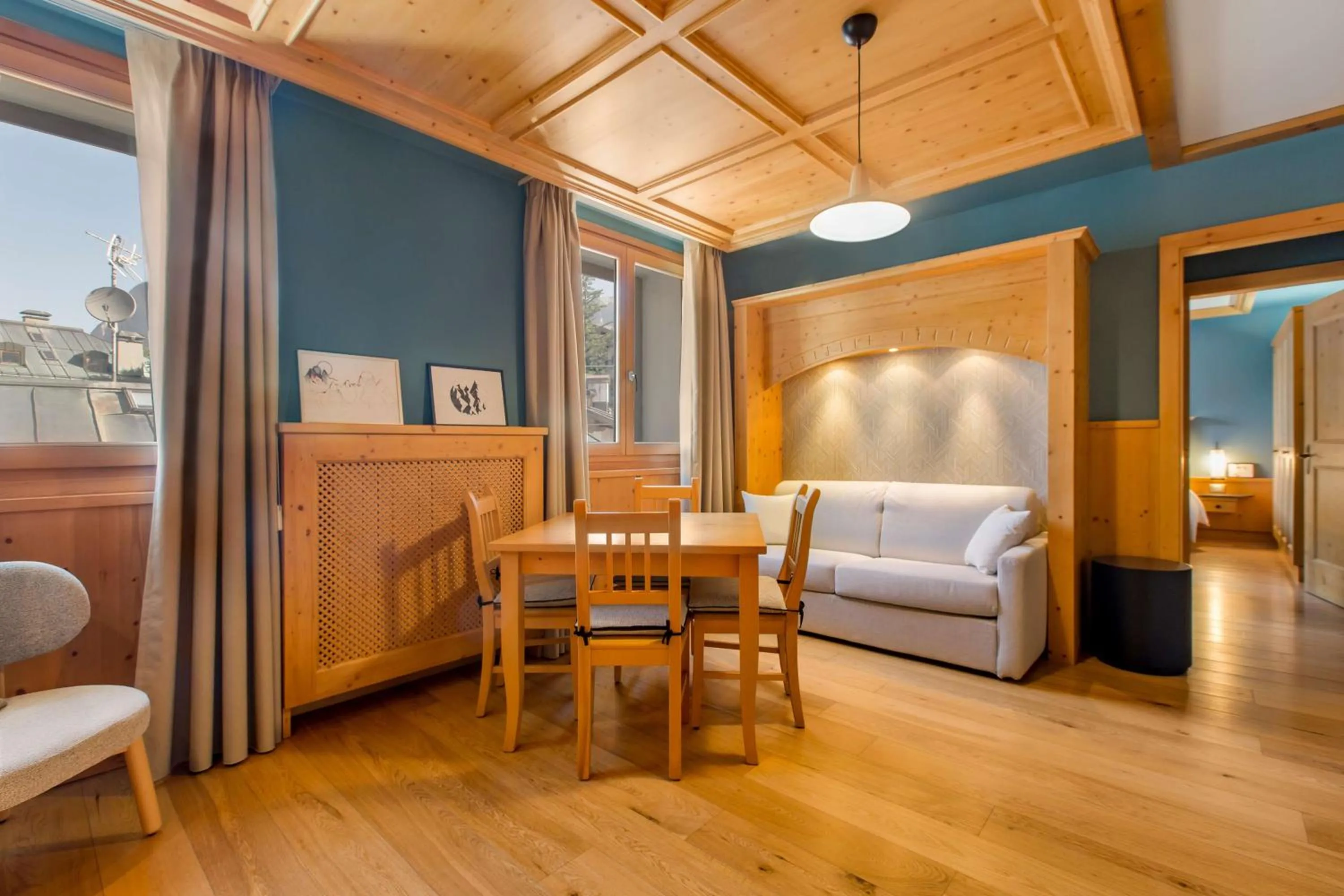 Photo of the whole room in Radisson Residences Savoia Palace Cortina d’Ampezzo