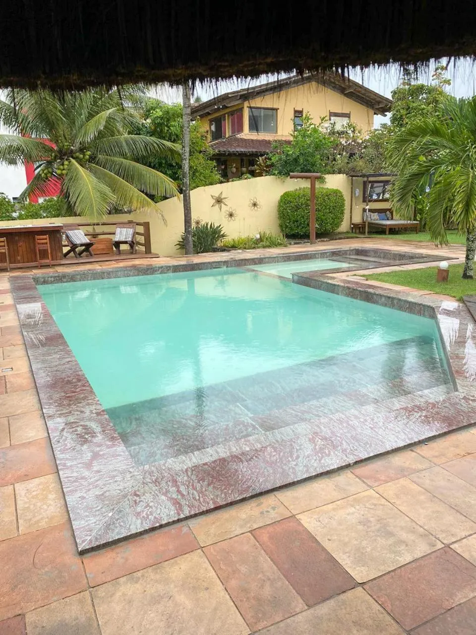 Swimming pool in Pousada dos Hibiscus