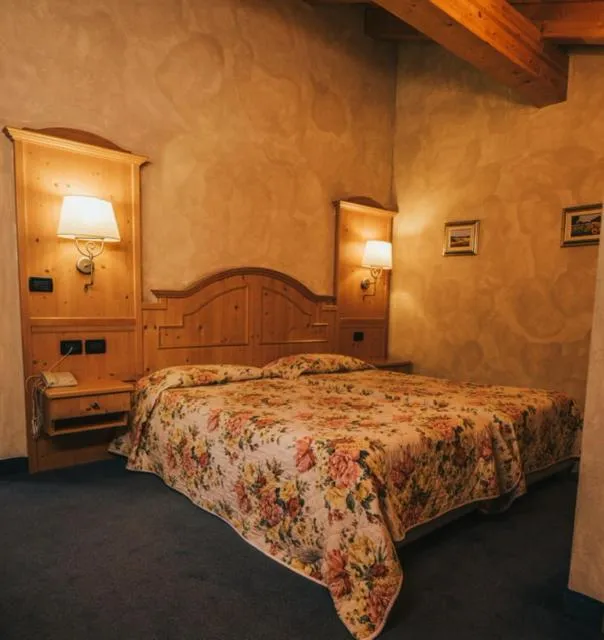 Bed in Hotel Primiero