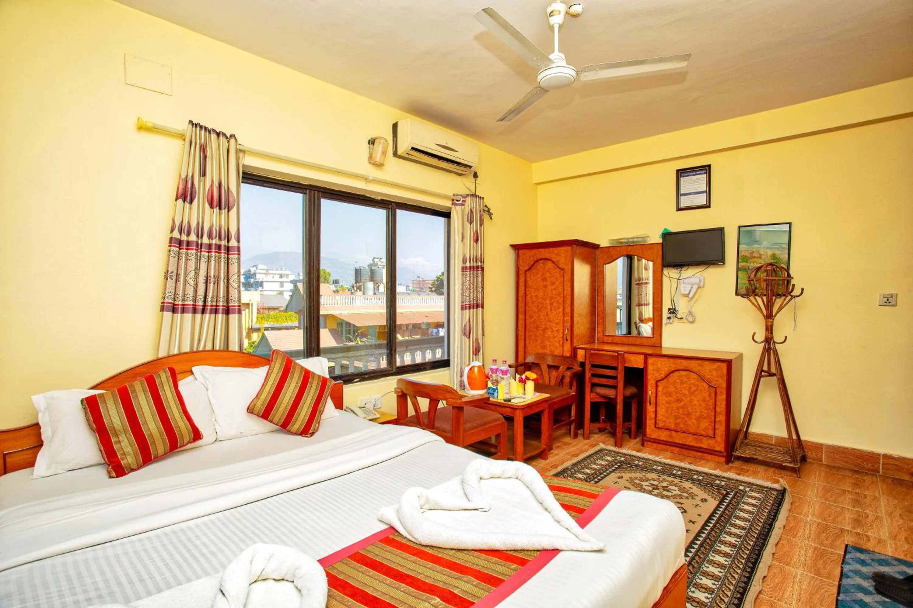 Bed in Hotel Grand Holiday