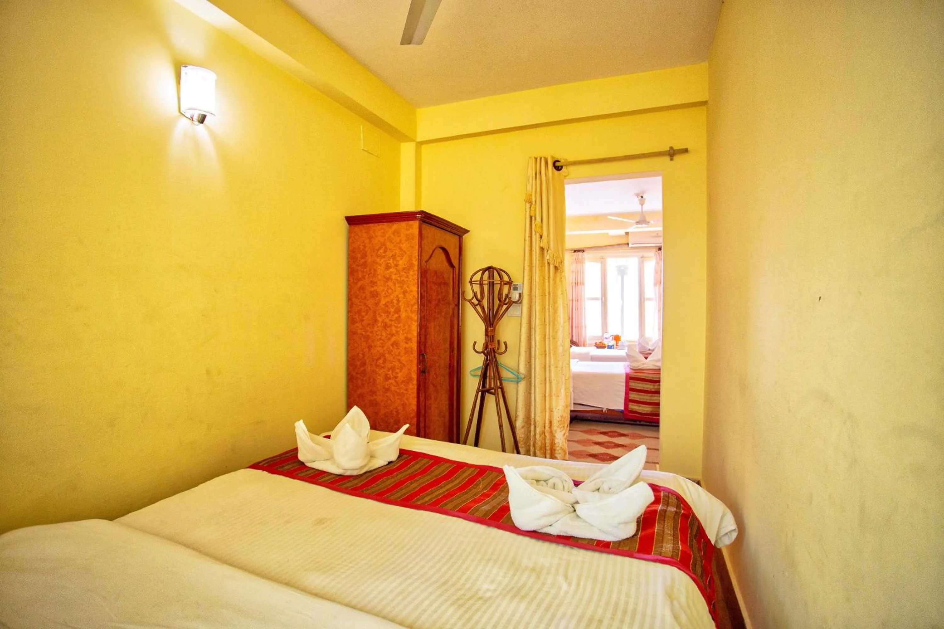 Bed in Hotel Grand Holiday