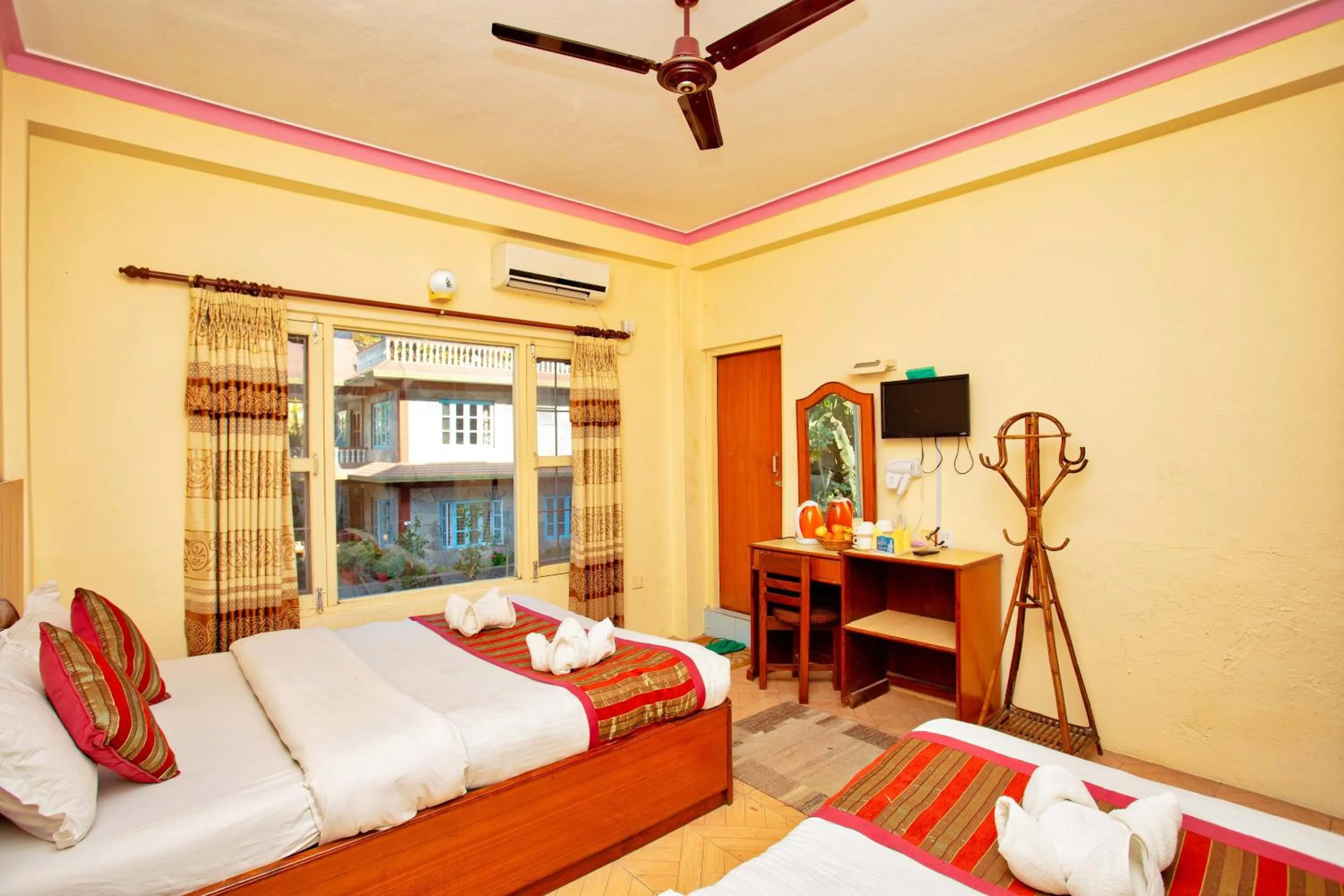 Bed in Hotel Grand Holiday