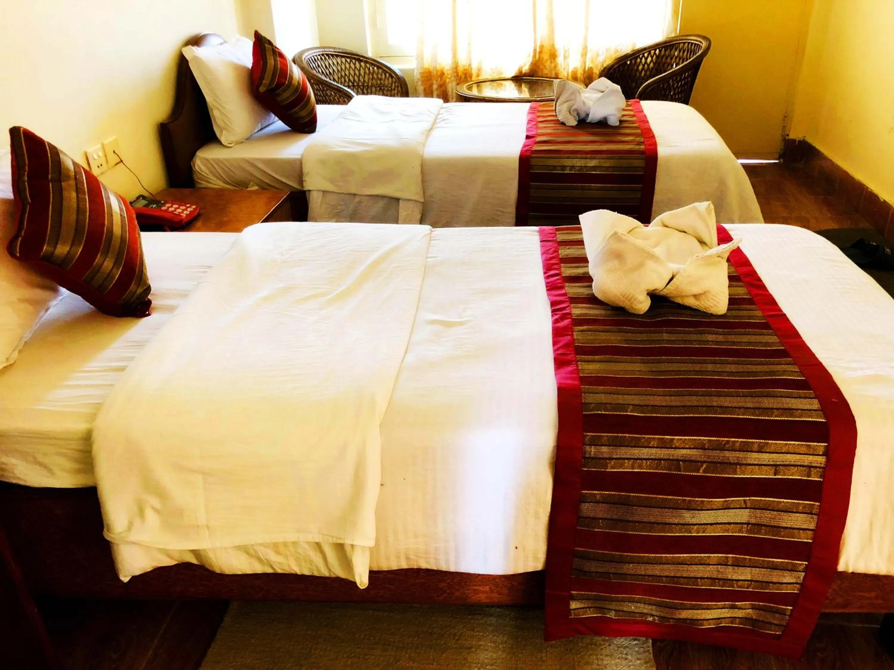 Bed in Hotel Grand Holiday