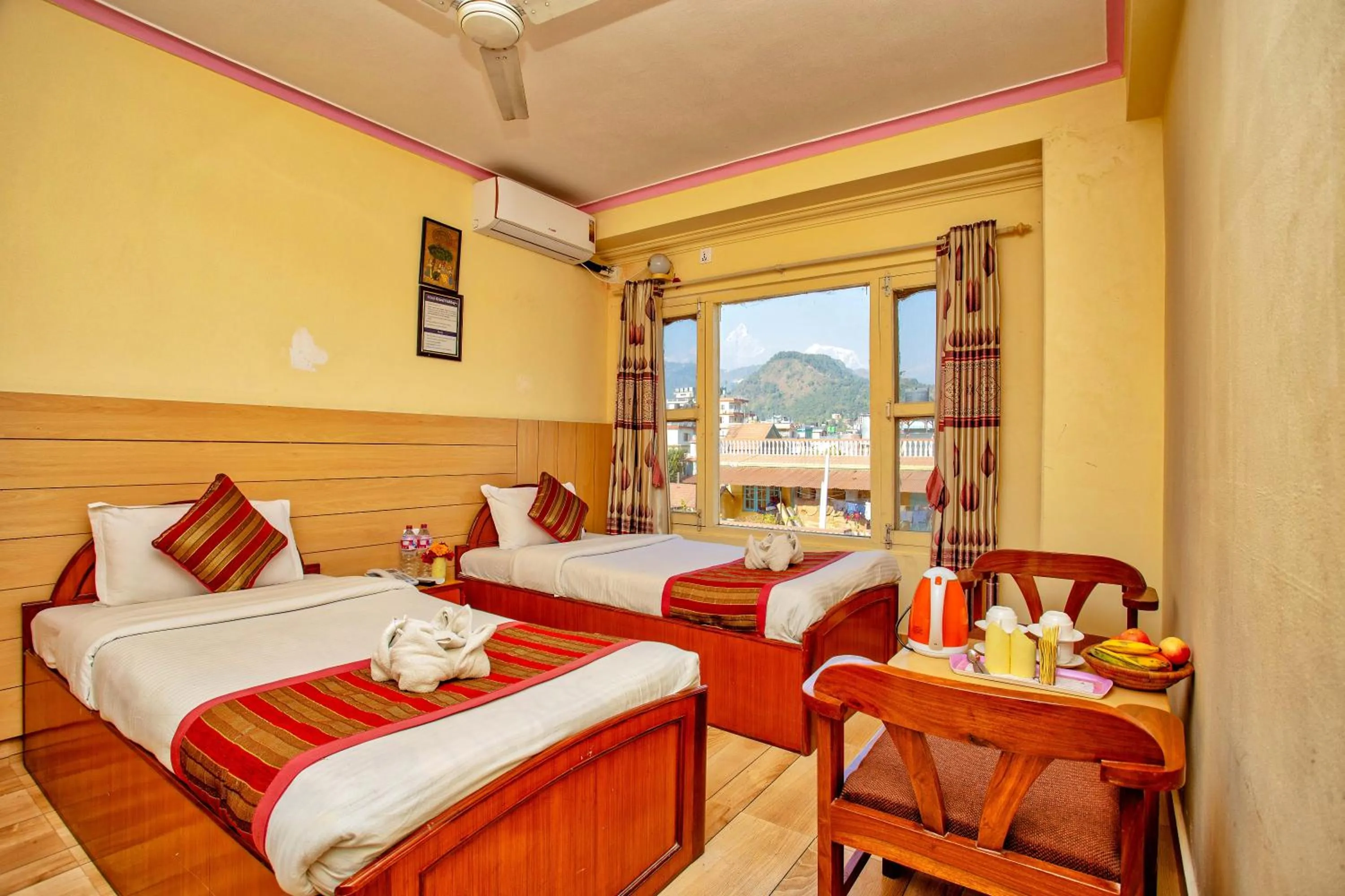 Bed in Hotel Grand Holiday