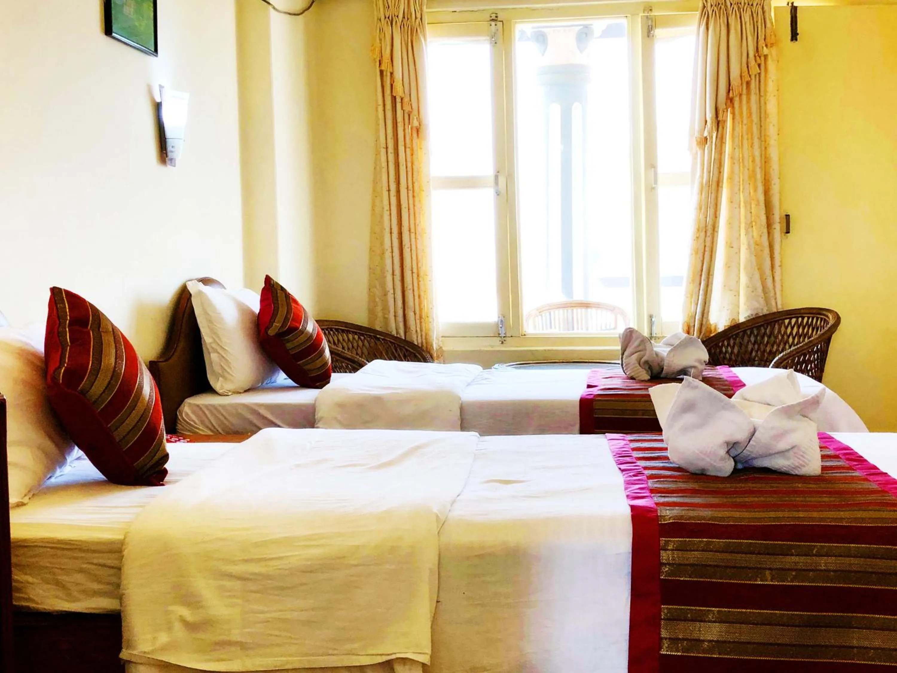 Bed in Hotel Grand Holiday