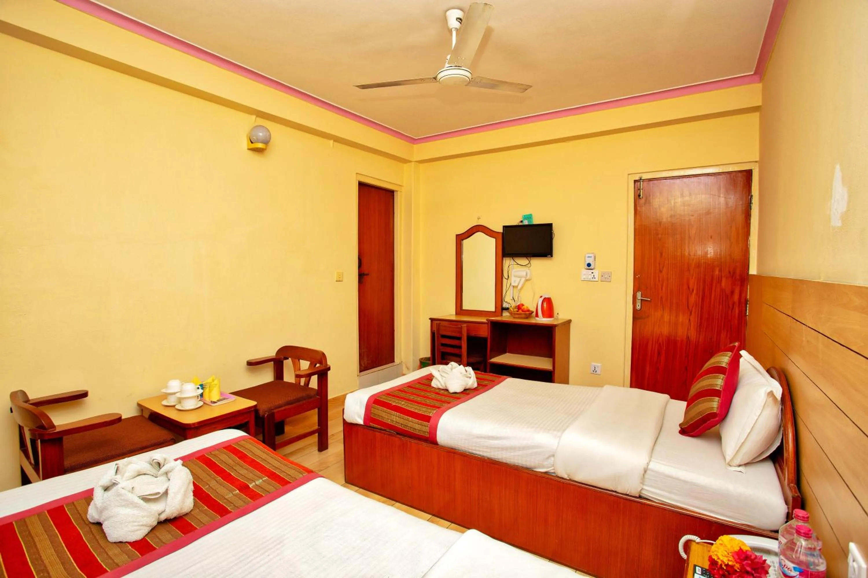 Bed in Hotel Grand Holiday