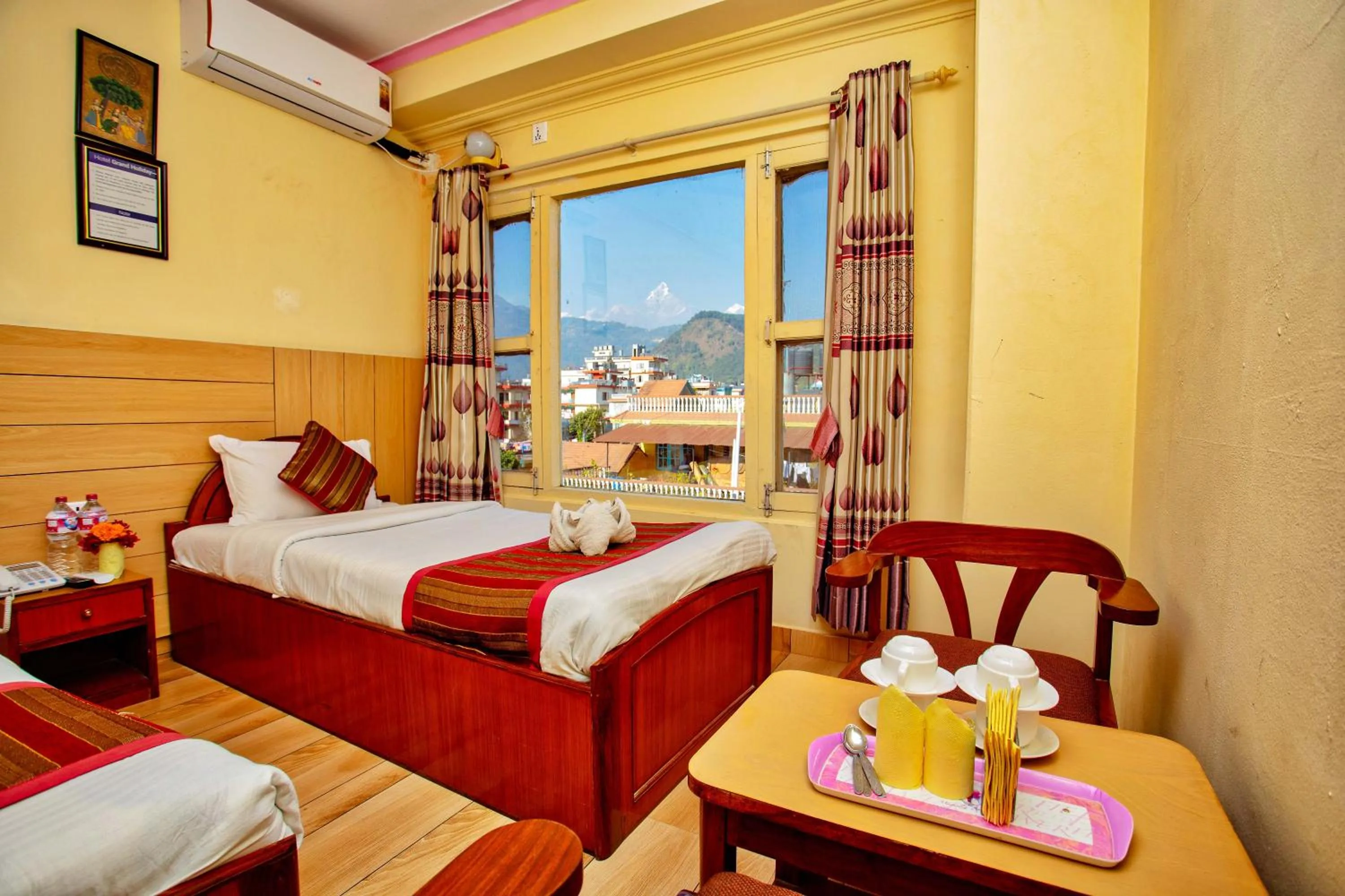 Bed in Hotel Grand Holiday