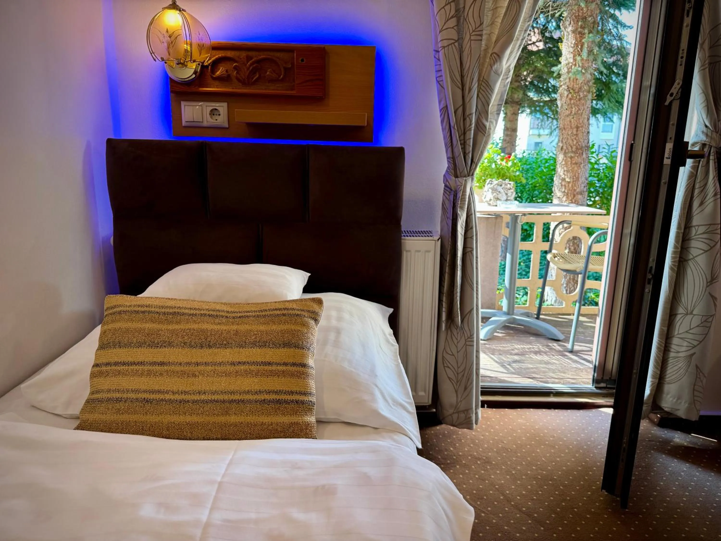 Bed in Fészek Fogadó - Pension Nest