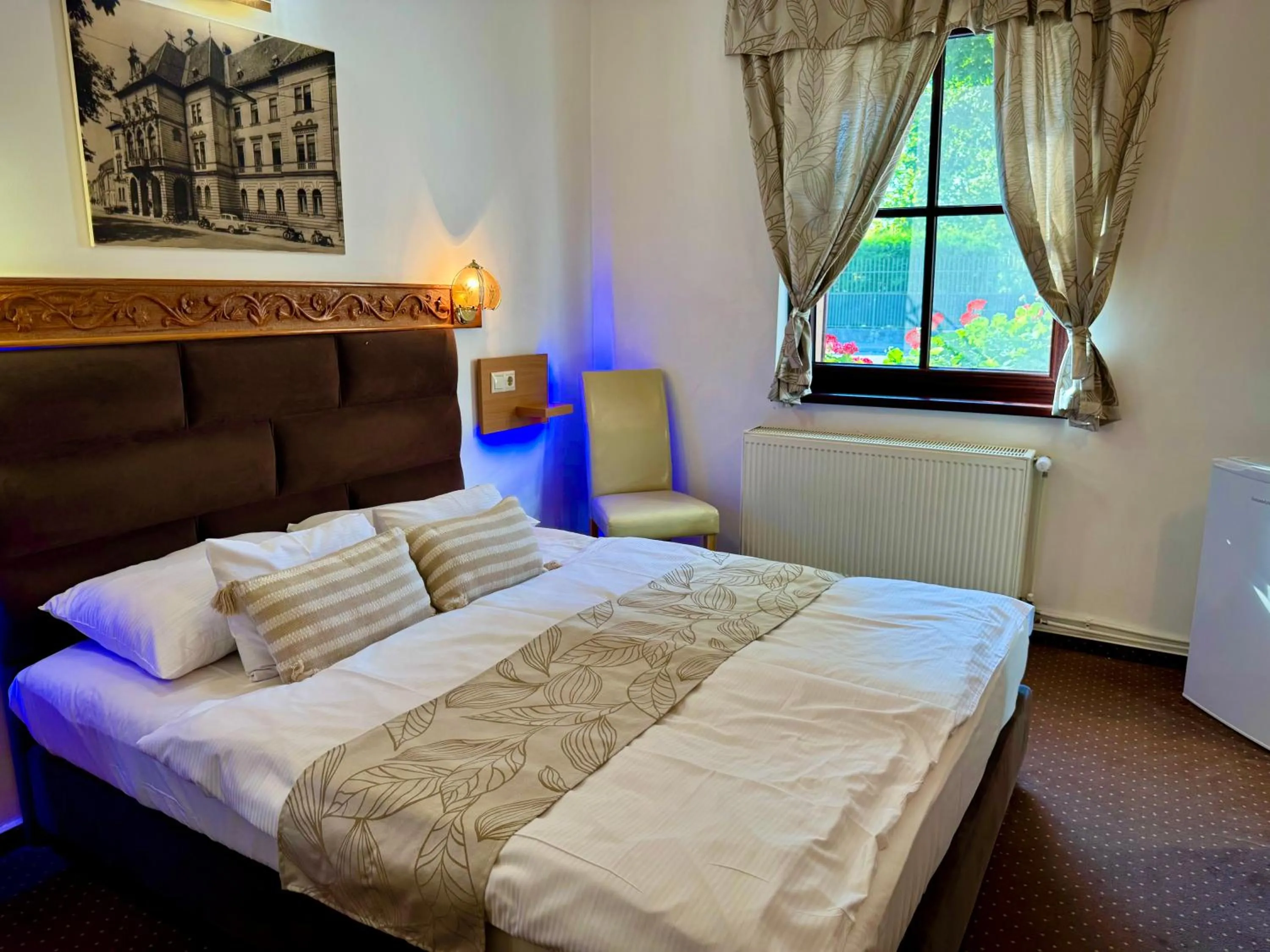 Bed in Fészek Fogadó - Pension Nest