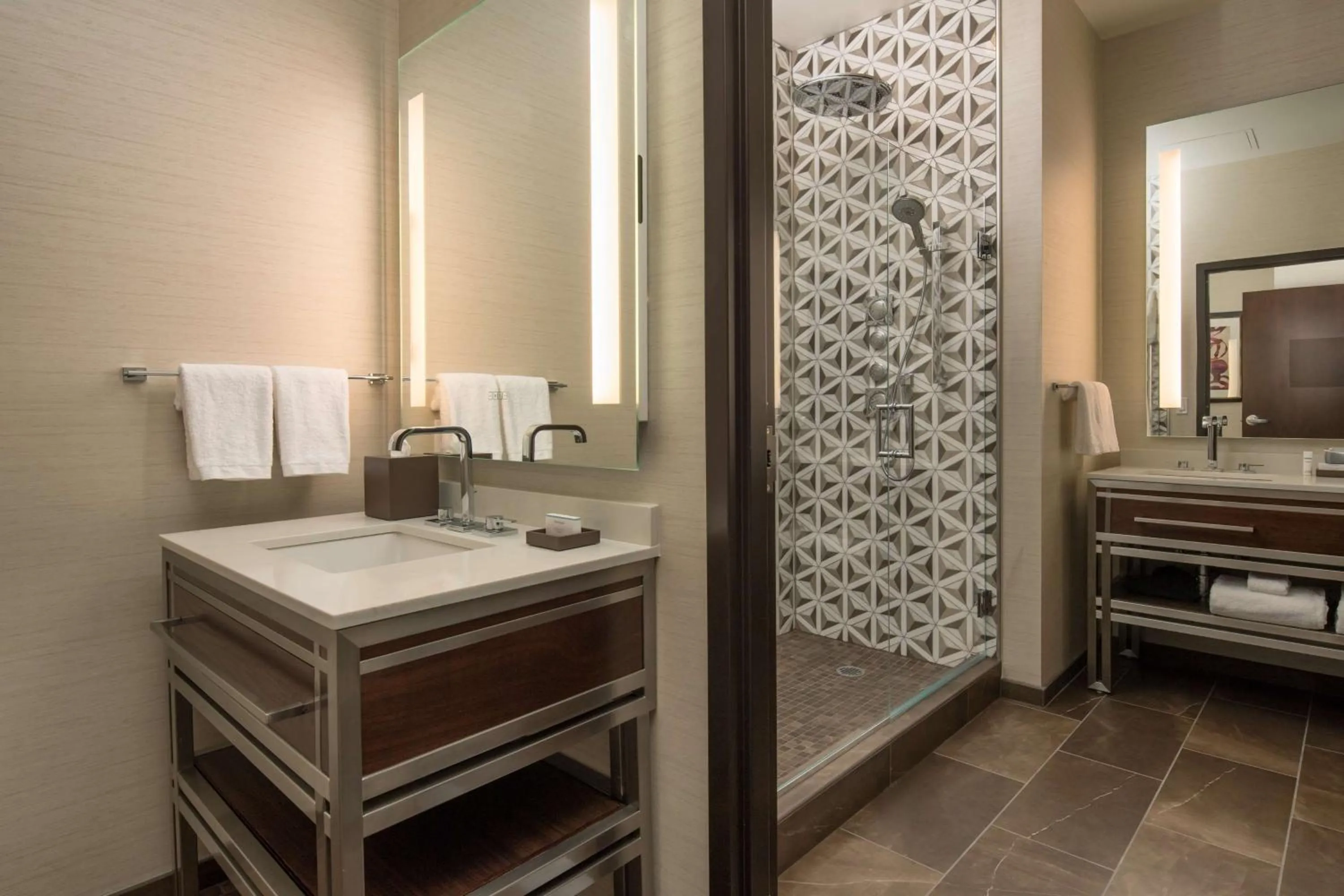 Bathroom in Embassy Suites By Hilton Seattle Downtown Pioneer Square