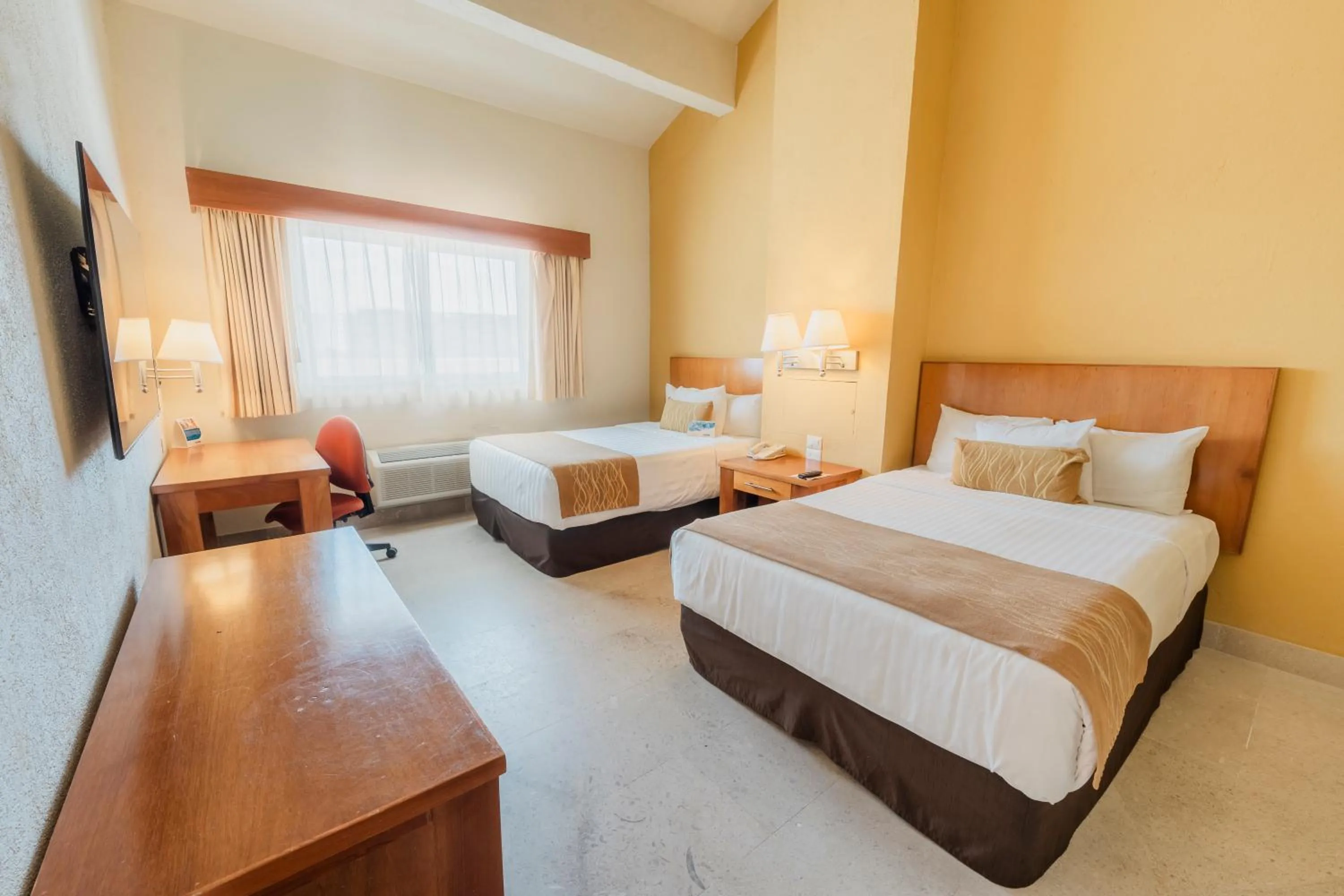 Bedroom, Bed in Comfort Inn Puerto Vallarta Golfside & Marina