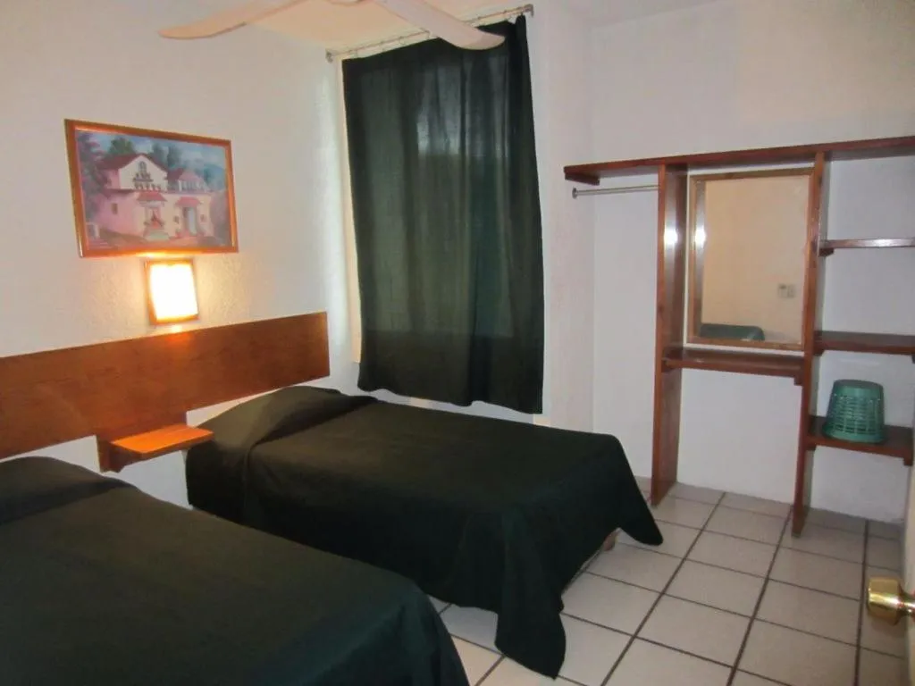 Bedroom, Bed in Hotel Vagabundo Puerto Vallarta