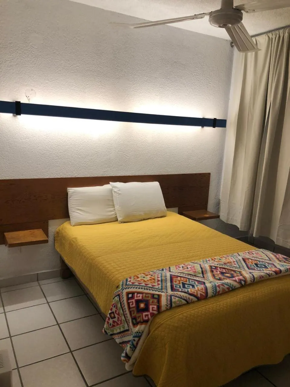 Bed in Hotel Vagabundo Puerto Vallarta