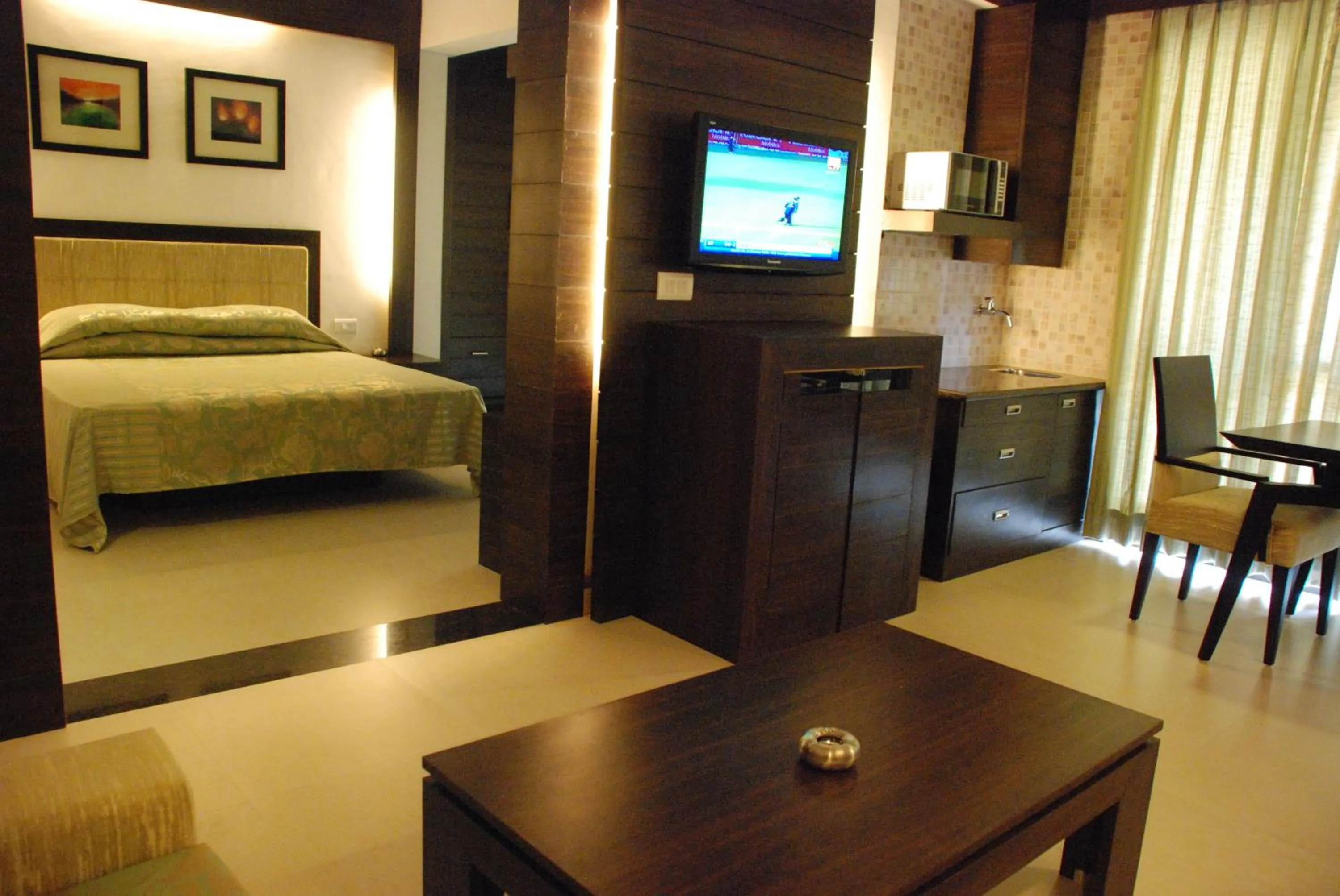 Kitchen or kitchenette, Bed in Le Magnifique