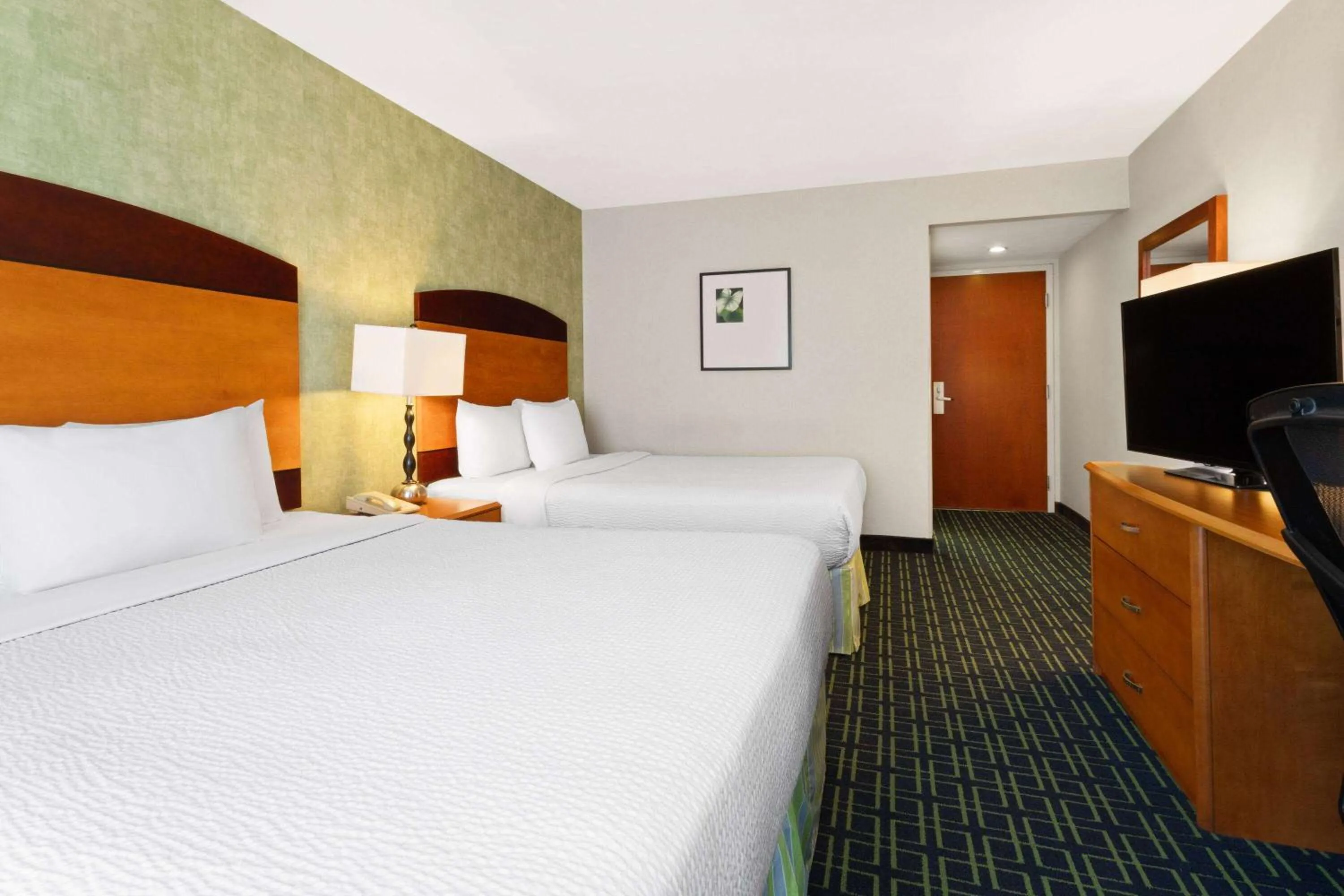 Photo of the whole room, Bed in Wyndham Garden Monterrey Aeropuerto