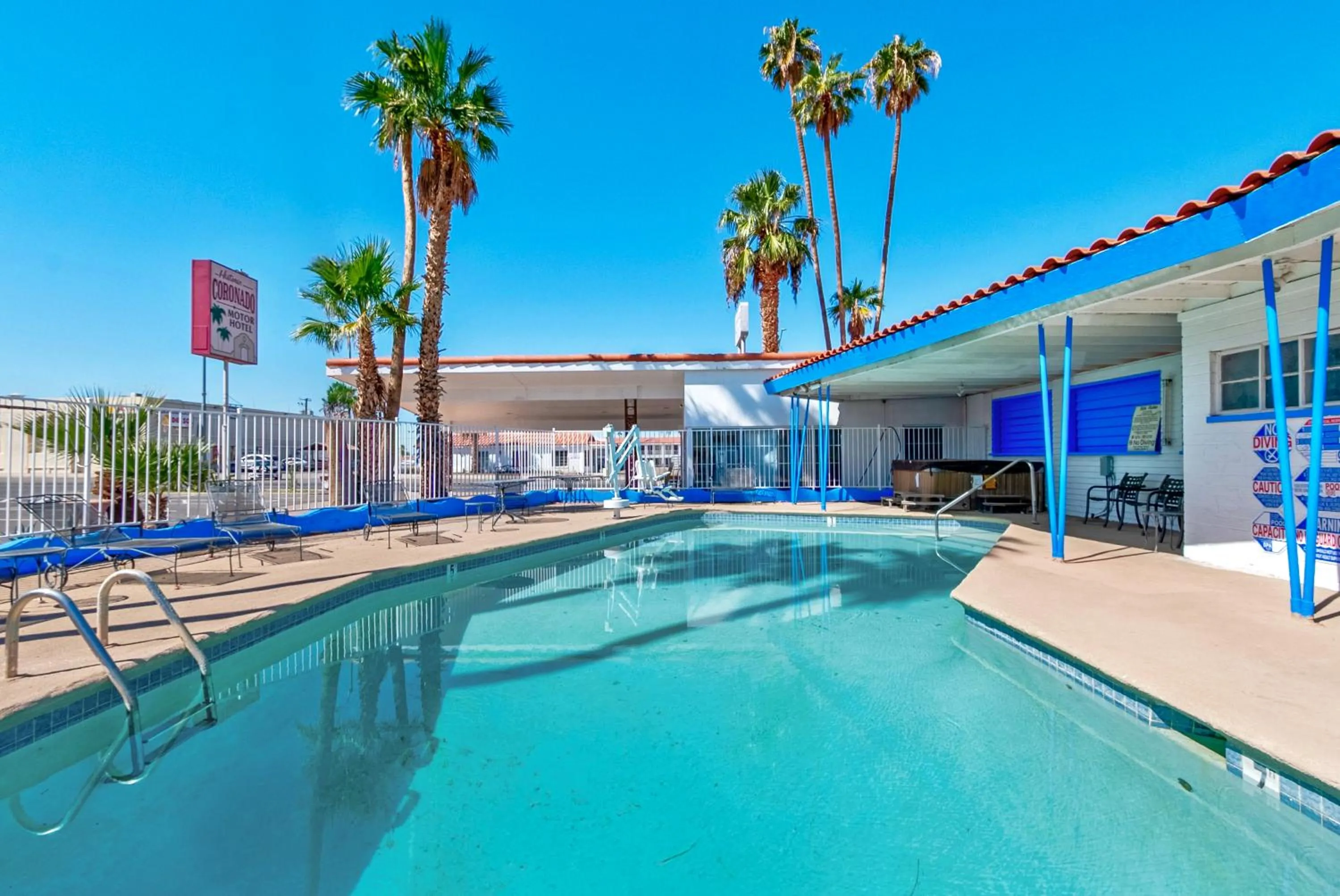 Swimming pool in Historic Coronado Motor Hotel by OYO