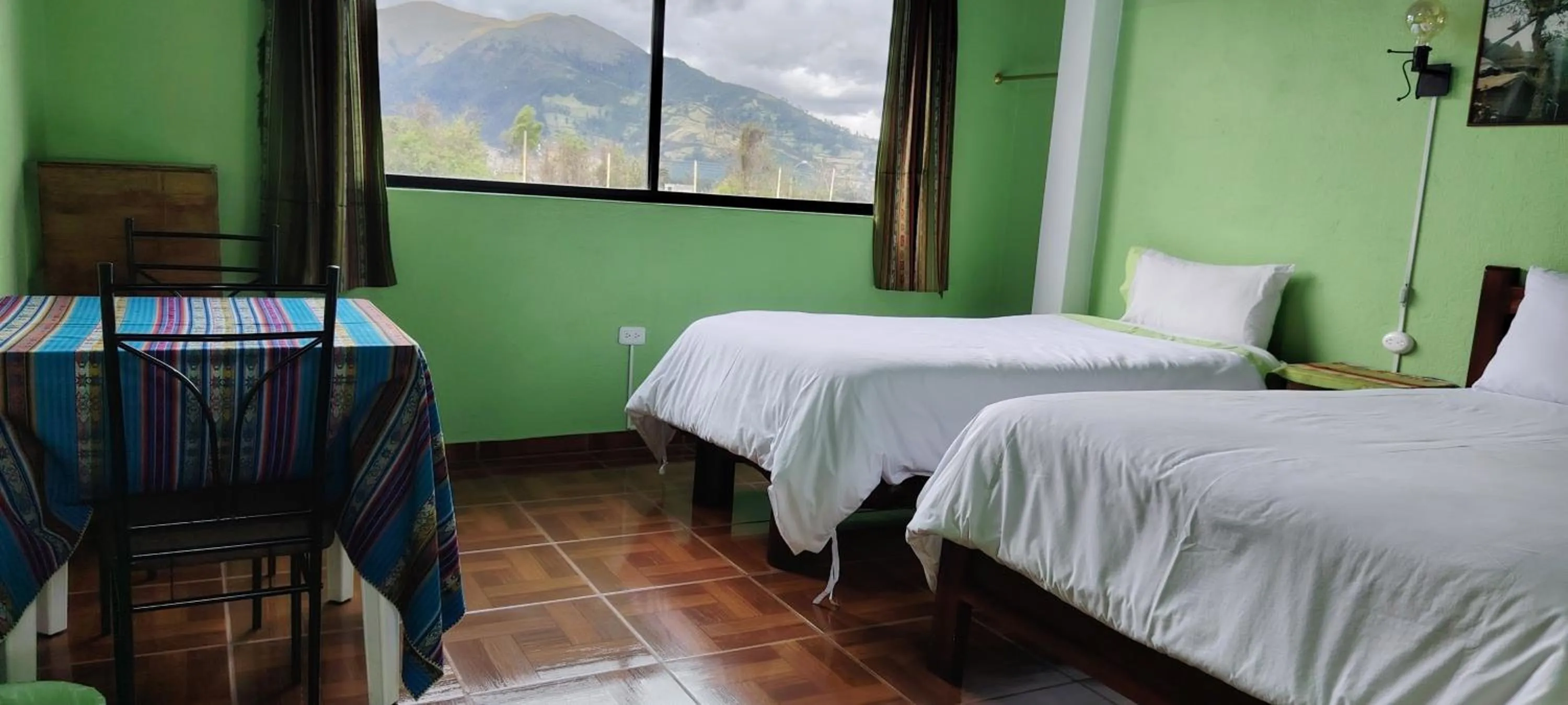 Photo of the whole room, Bed in Green House Araque Inn