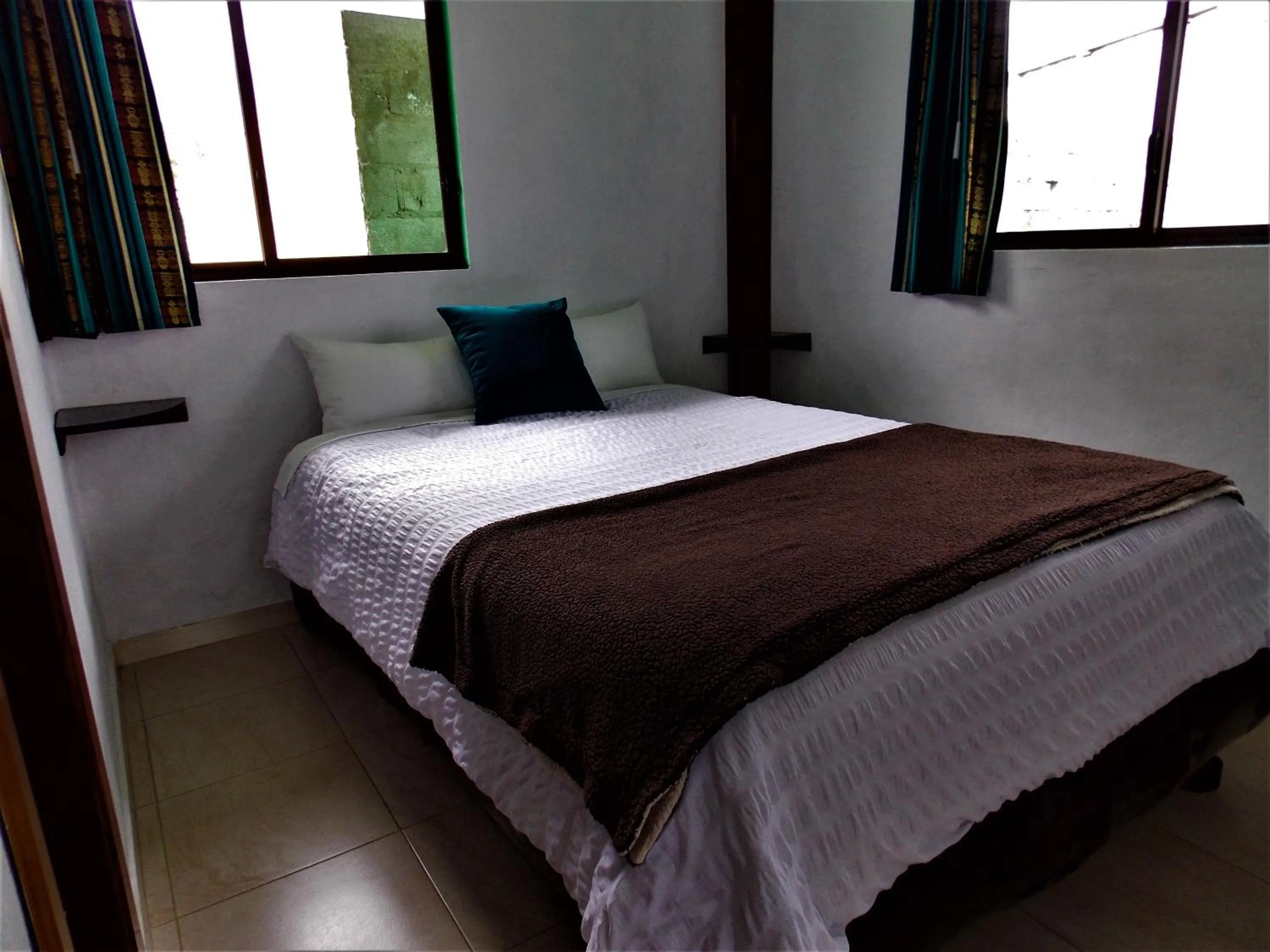 Photo of the whole room, Bed in Green House Araque Inn