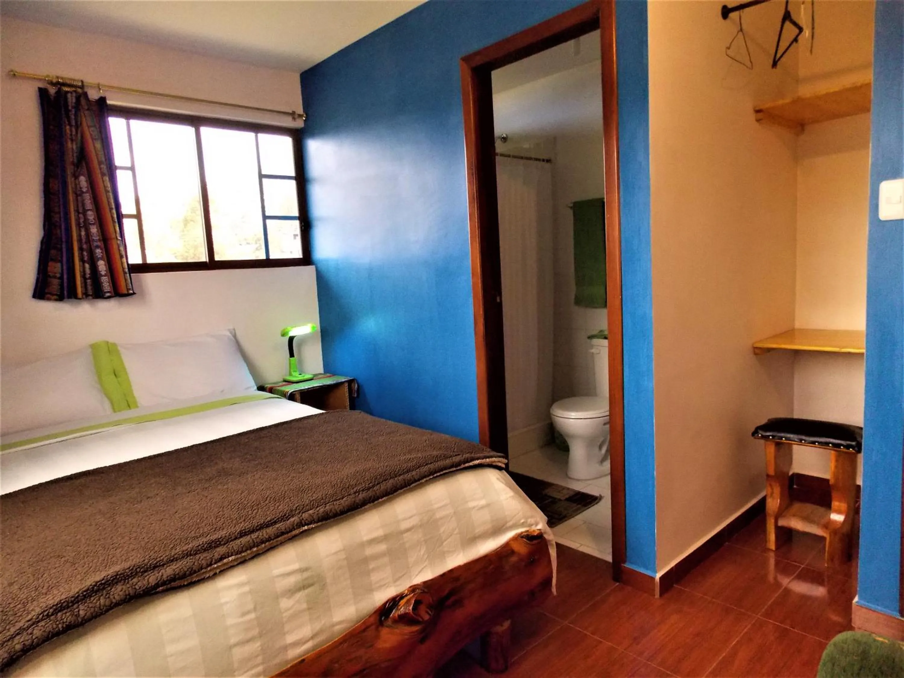 Photo of the whole room, Bed in Green House Araque Inn