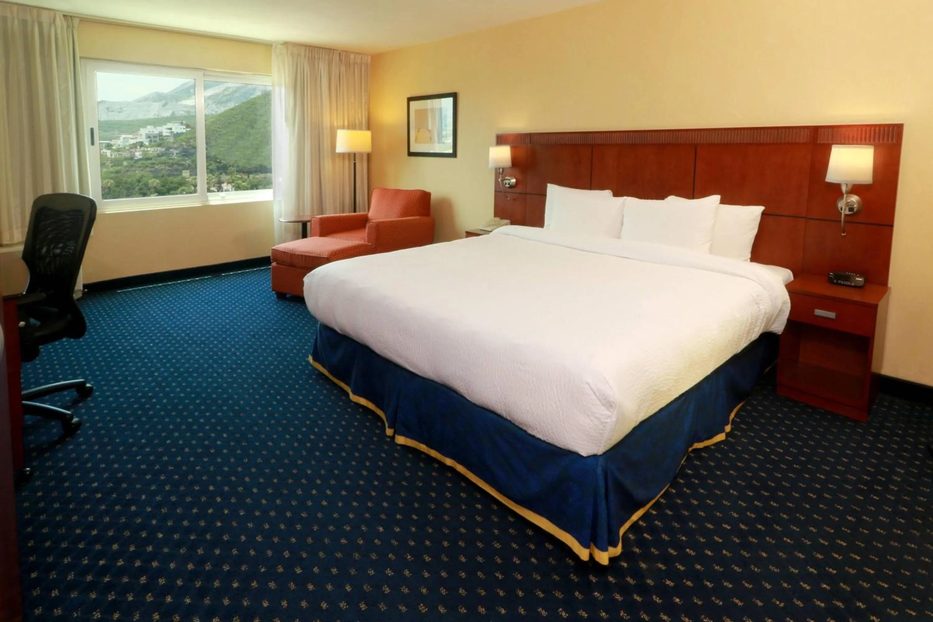 Photo of the whole room, Bed in Courtyard Monterrey San Jeronimo