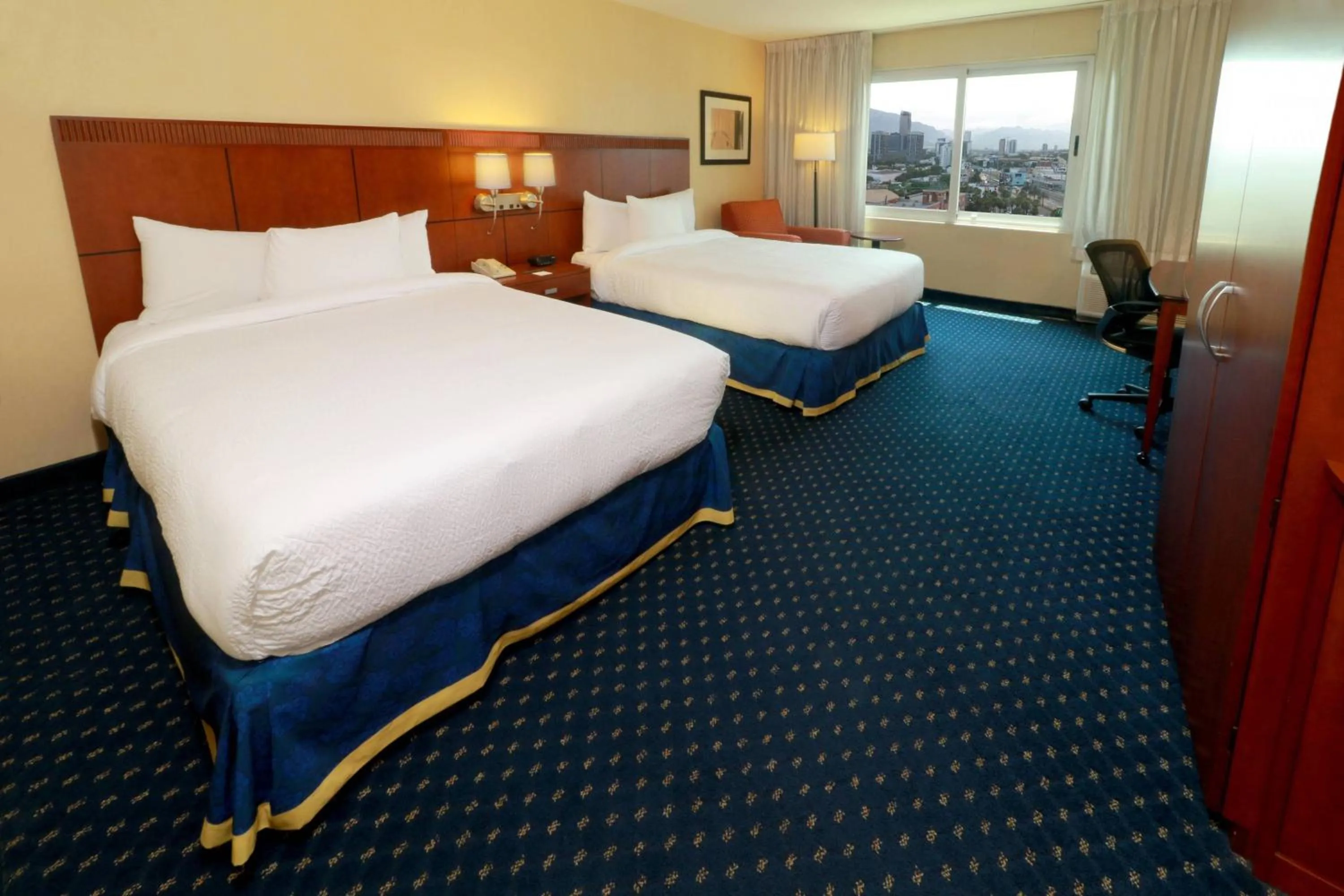 Photo of the whole room, Bed in Courtyard Monterrey San Jeronimo