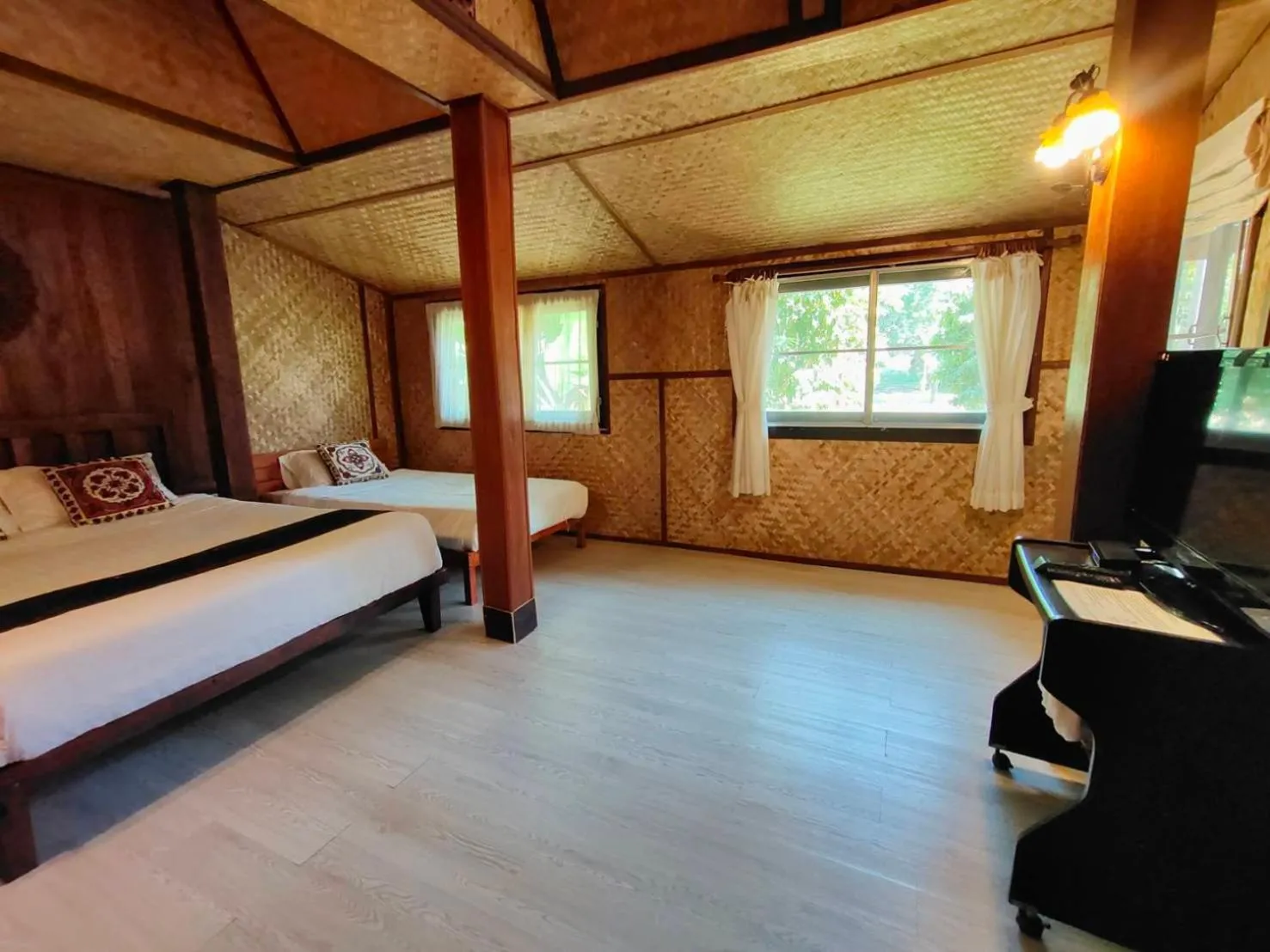 Bed in Baantawan Guesthouse Pai