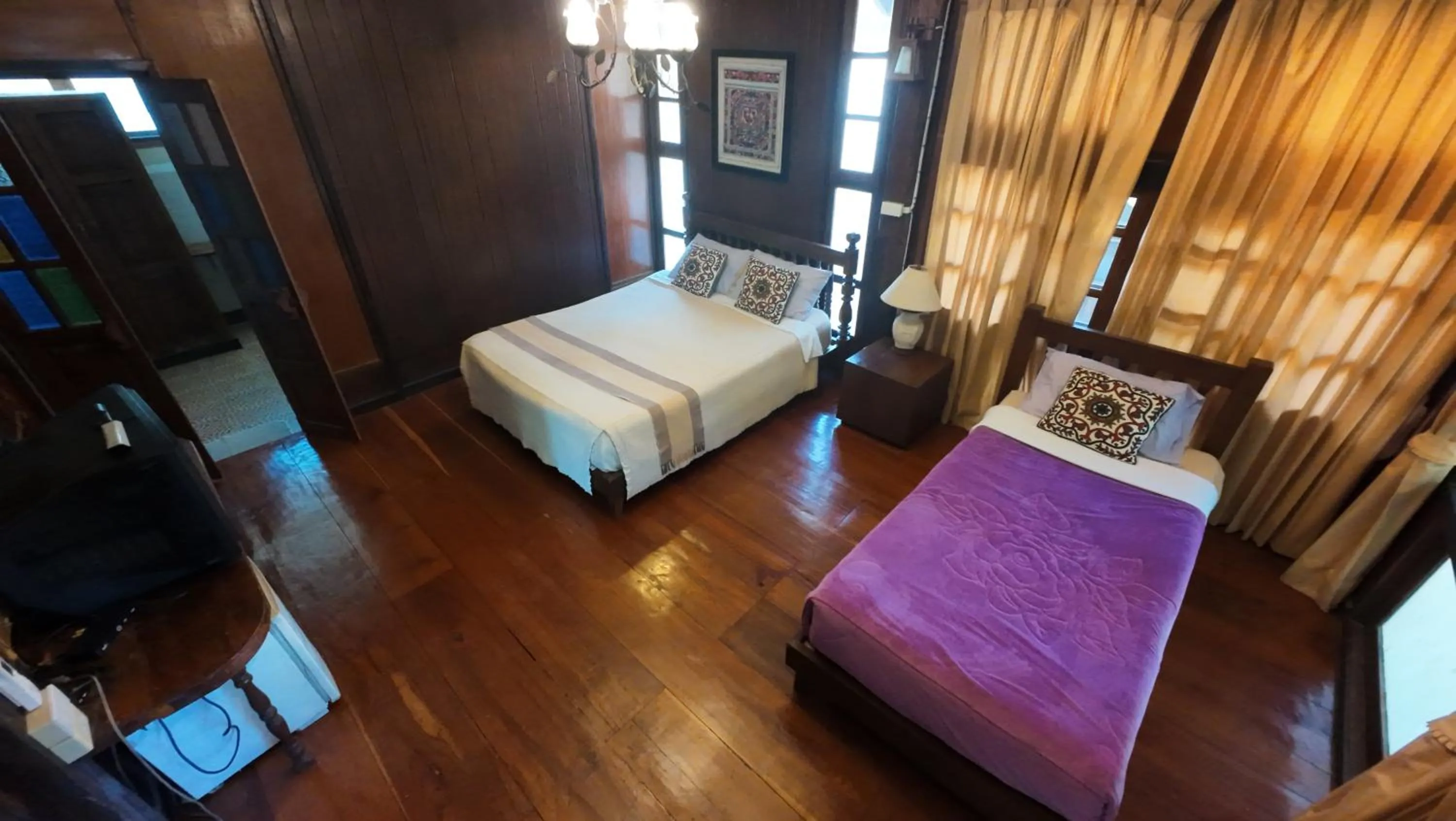 Bed in Baantawan Guesthouse Pai