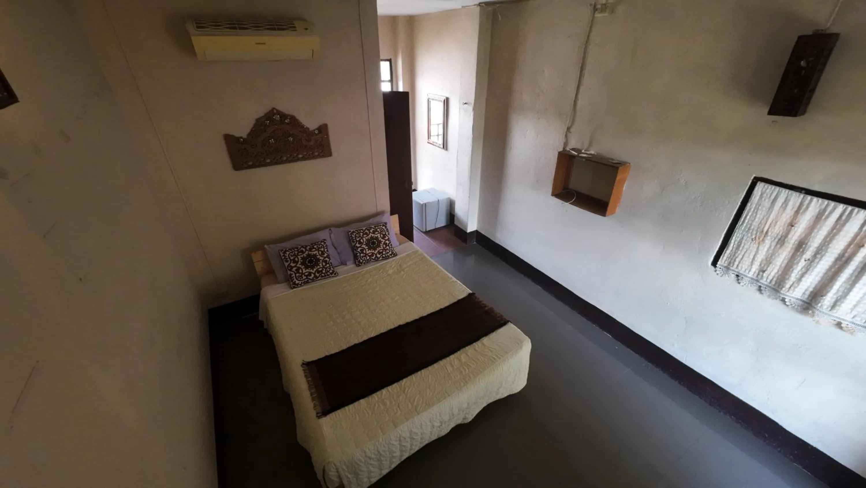 Bed in Baantawan Guesthouse Pai