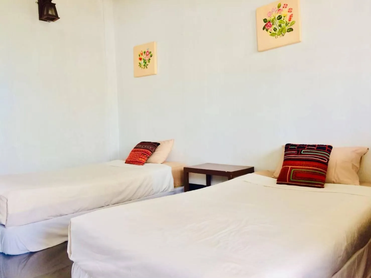 Bed in Baantawan Guesthouse Pai