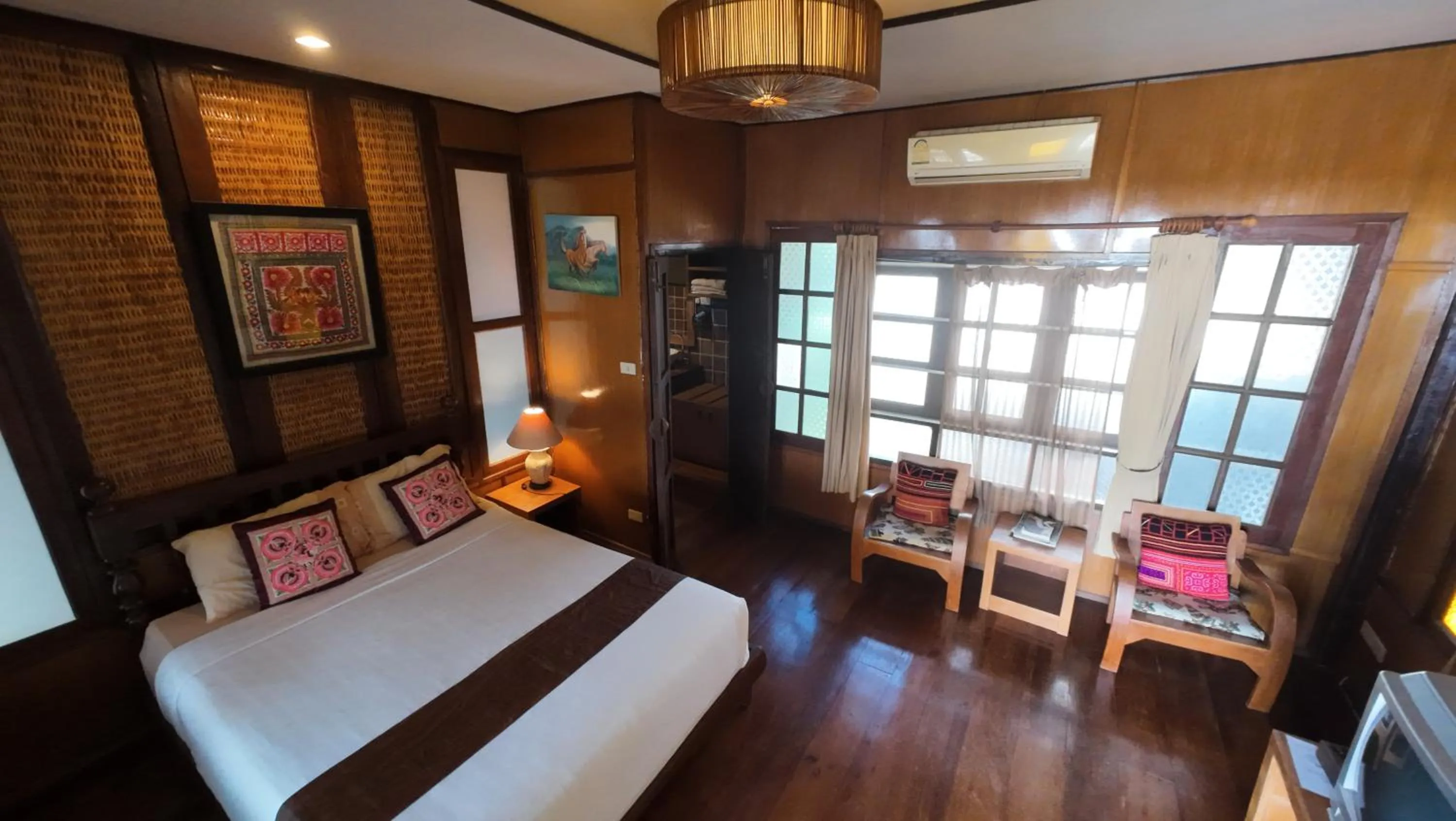 Bed in Baantawan Guesthouse Pai