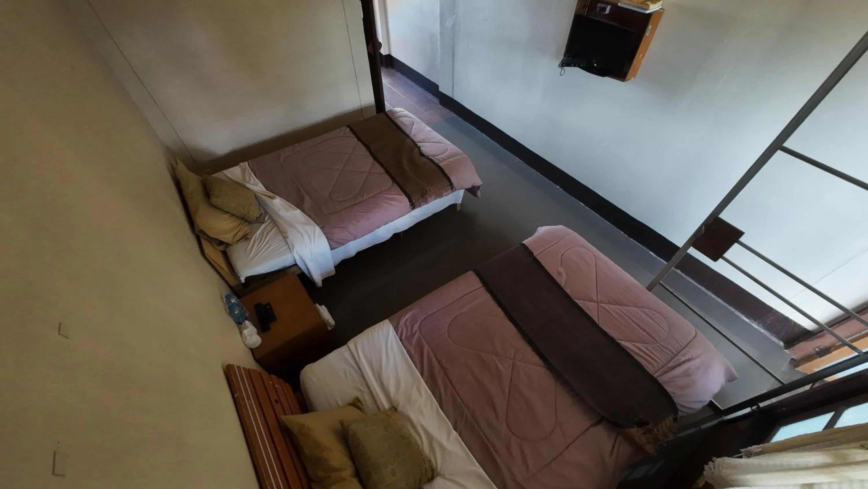 Bed in Baantawan Guesthouse Pai