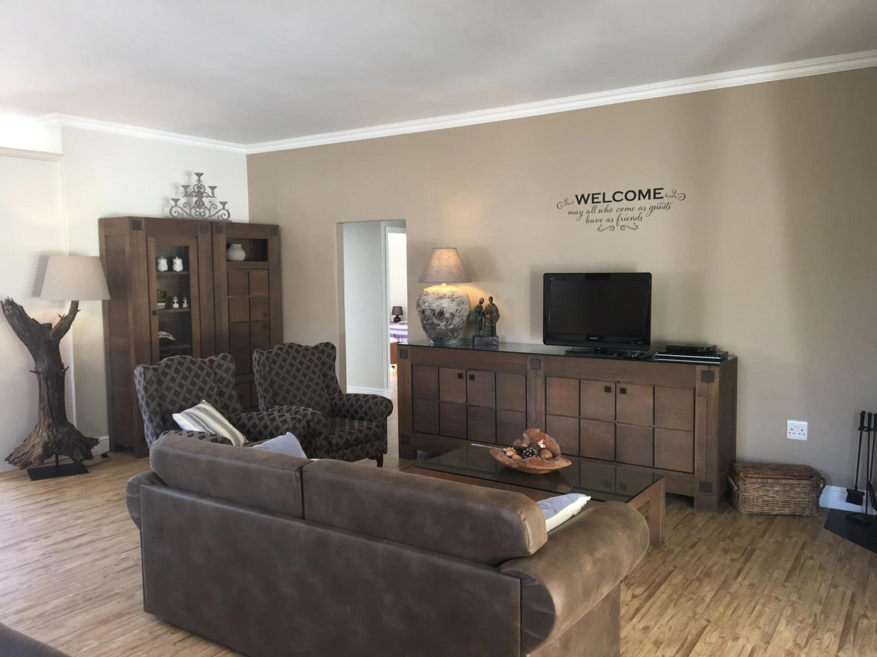 Living room in African Palm Cottage and Guesthouse
